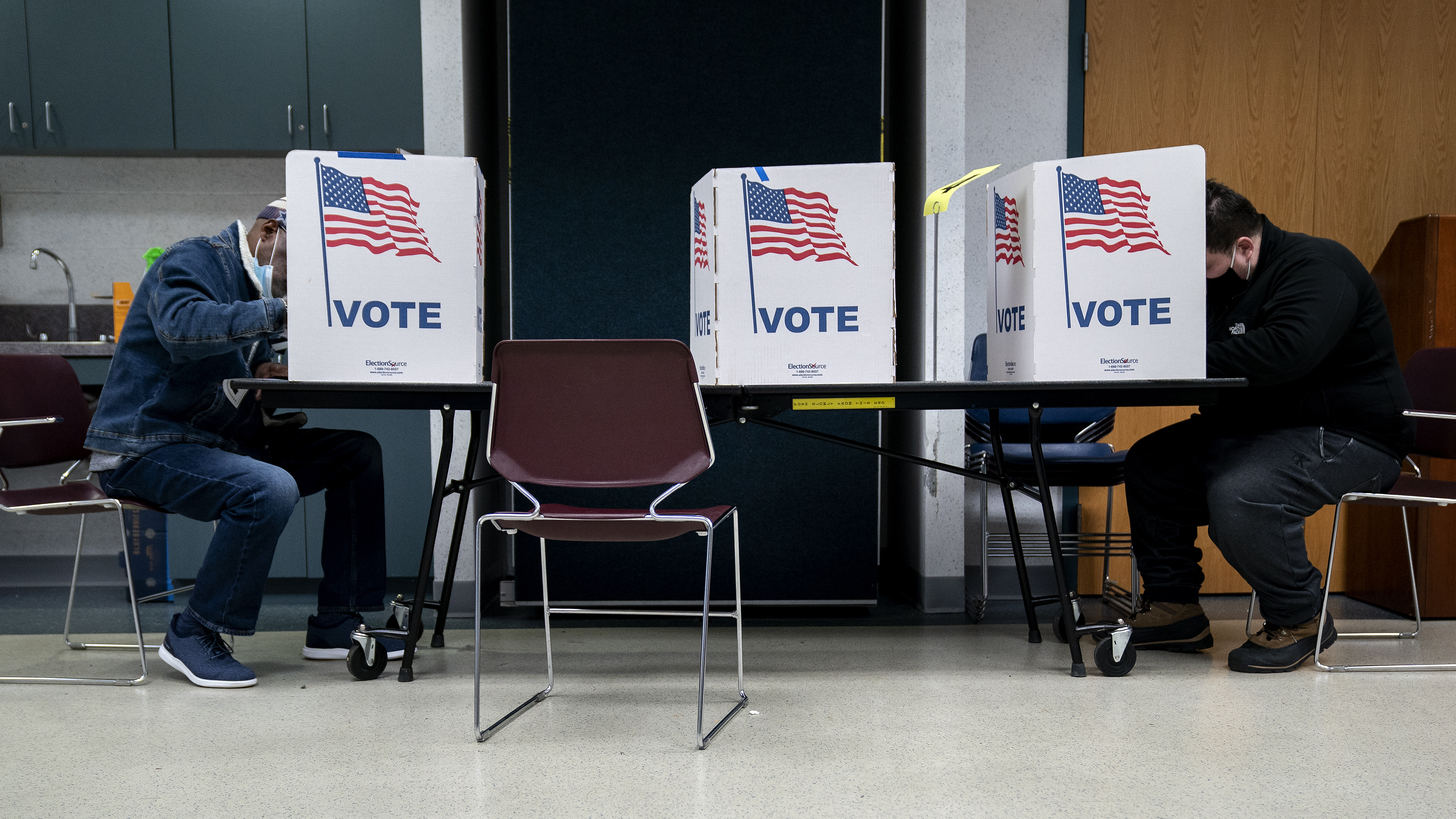 Voters fill out 2020 general election ballots in Alexandria, Va. A state-level Voting Rights Act is now on the governor's desk. (Getty Images)