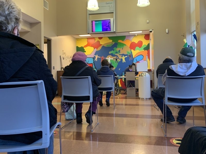 Patients at a community health center in Nashville wait for their vaccine appointment. The Biden administration has announced that federally-funded community health centers around the country will start getting direct shipments of the vaccine. (WPLN News)