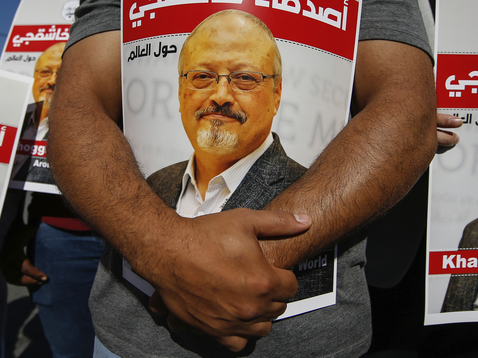 Lawmakers and journalists are among those calling for penalties against Saudi Crown Prince Mohammed bin Salman for the 2018 killing of <em>Washington Post</em> columnist Jamal Khashoggi after a U.S. intelligence report finding the crown prince had approved the operation. (Emrah Gurel/AP)
