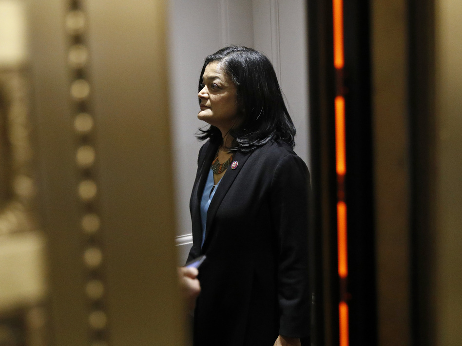 "You know, it's like a gut punch to millions of people," Washington Rep. Pramila Jayapal, who chairs the House Progressive Caucus, said about the $15-an-hour minimum wage coming out of President Biden's COVID-19 relief package. But she says her vote will be based on the bill as a whole, even though it doesn't include the wage hike. (Patrick Semansky/AP)