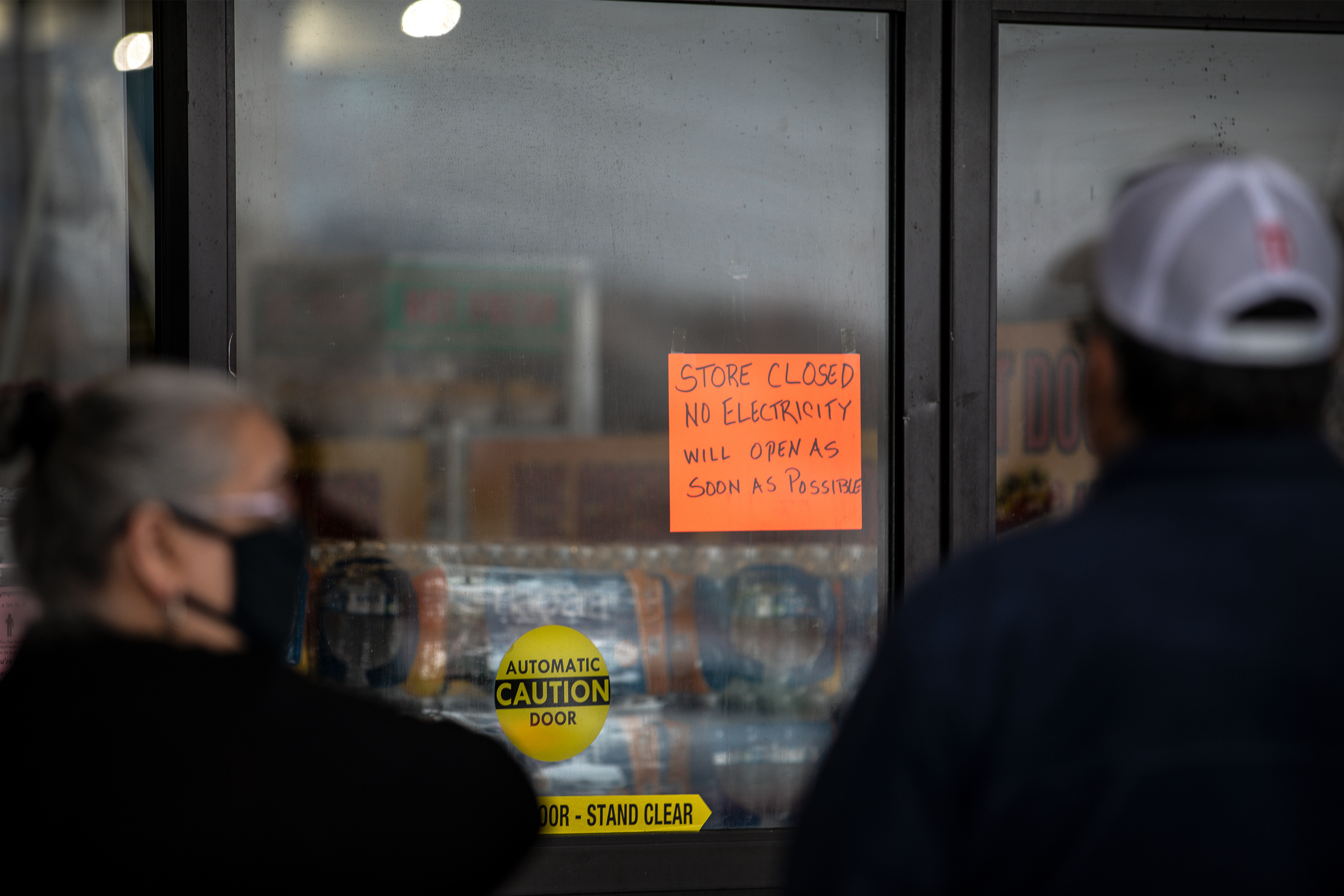 People wait in line for Fiesta Mart to open after the store lost electricity in Austin, Texas on February 17, 2021. (Getty Images)