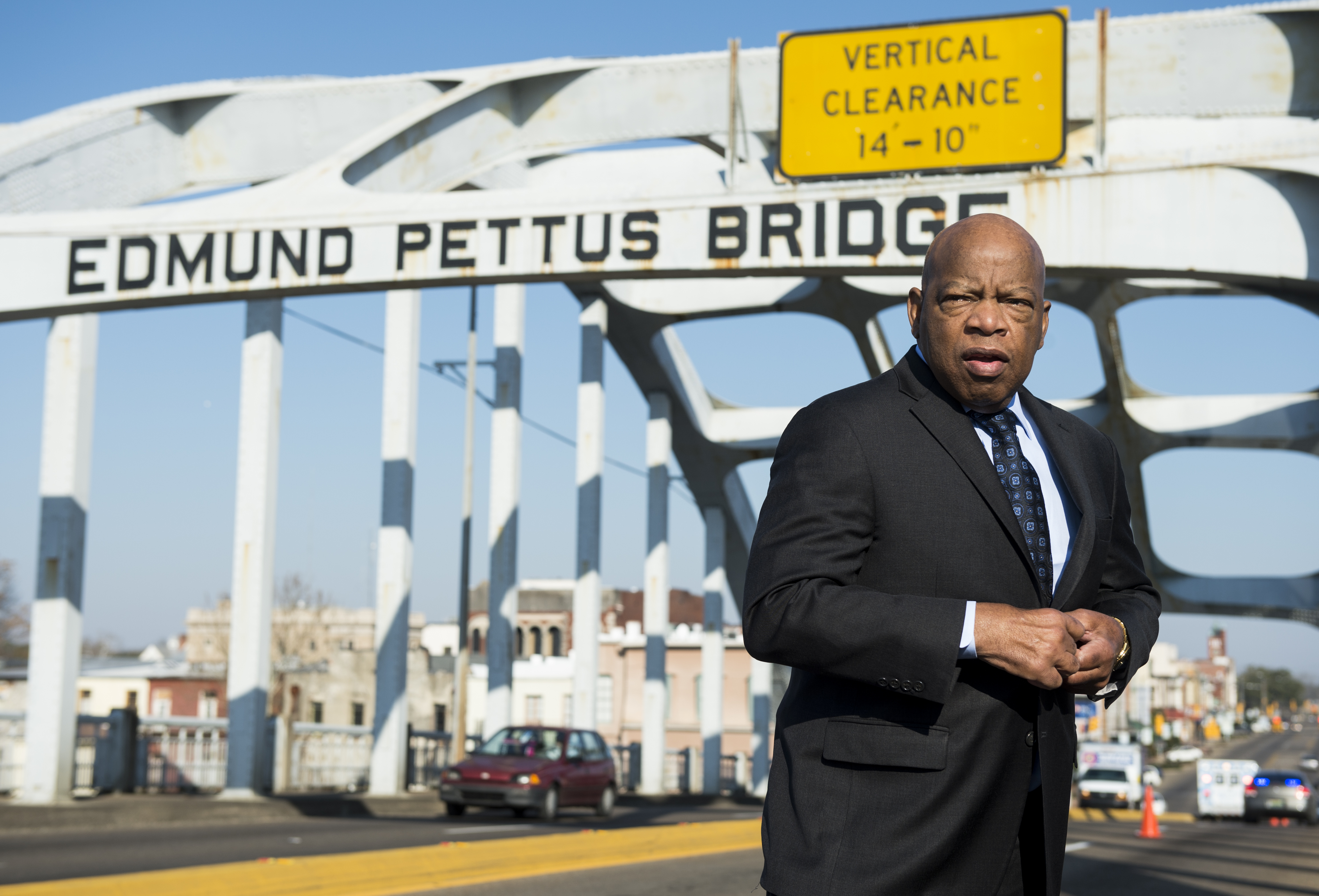 In 2015, the late Rep. John Lewis stands on the Edmund Pettus Bridge in Selma, Ala., where he was beaten by police on &quot;Bloody Sunday.&quot; (CQ-Roll Call via Getty Images)