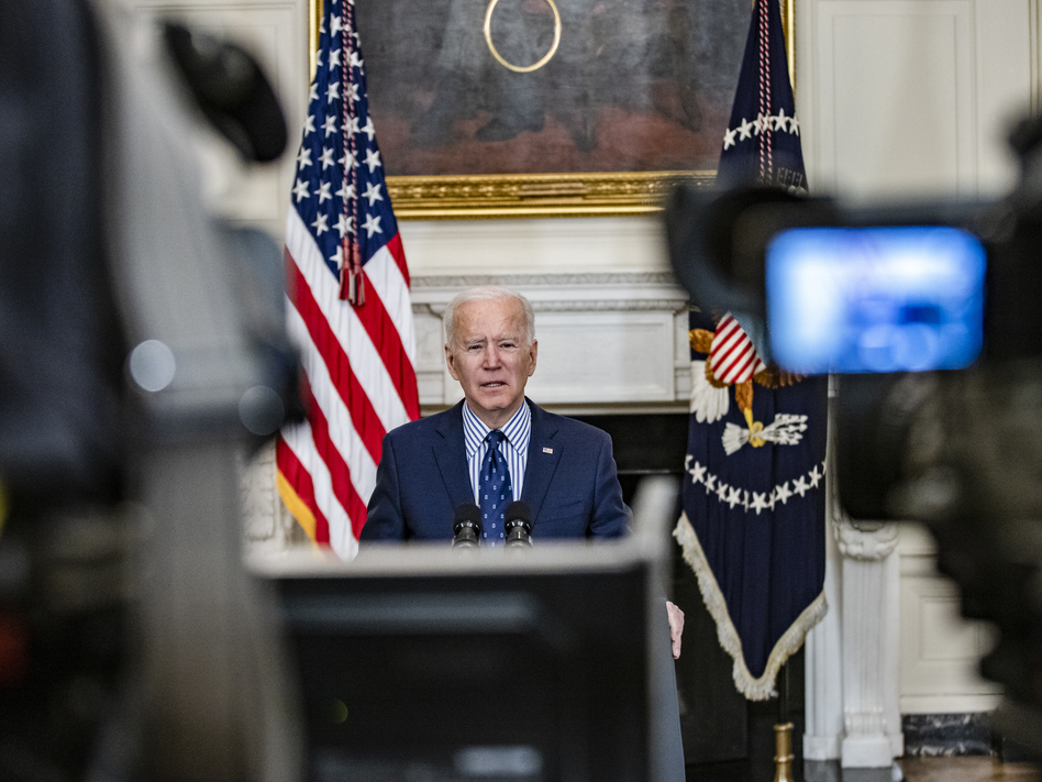President Biden speaks from the State Dining Room of the White House on Saturday, following the Senate's passage of his COVID-19 relief package by a 50-49 vote. (Samuel Corum/Getty Images)
