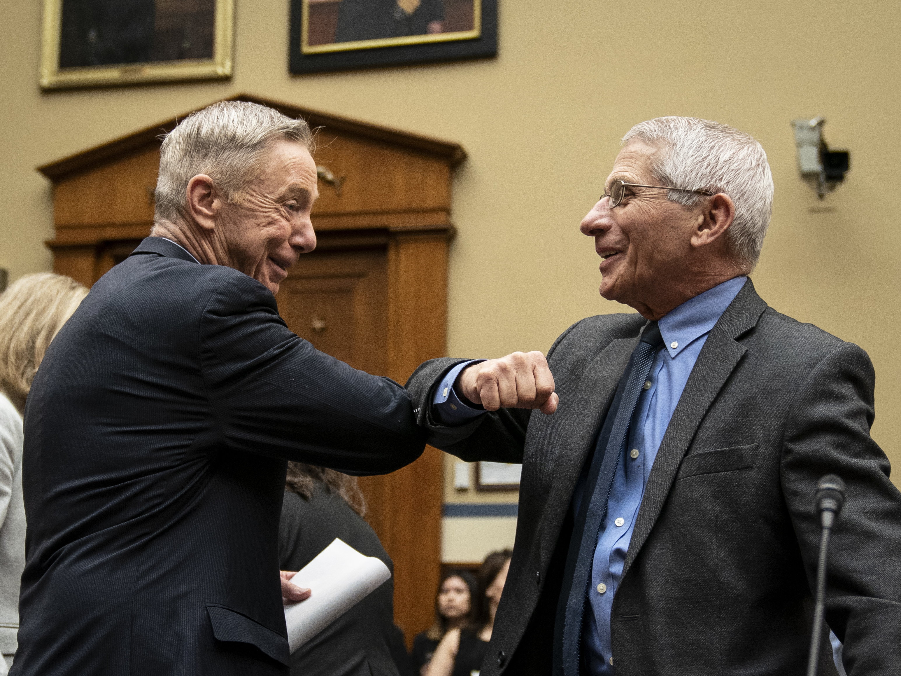 Before there were masks, there were elbow bumps. Rep. Stephen Lynch, D-Mass., and Dr. Anthony Fauci greet each other before a House Oversight and Reform Committee hearing on March 11, 2020. (Getty Images)