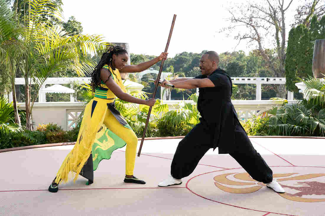 Women have power — but also lack power — in Coming 2 America, starring Eddie Murphy (right) as an African king with three daughters and a newly discovered out-of-wedlock son.
