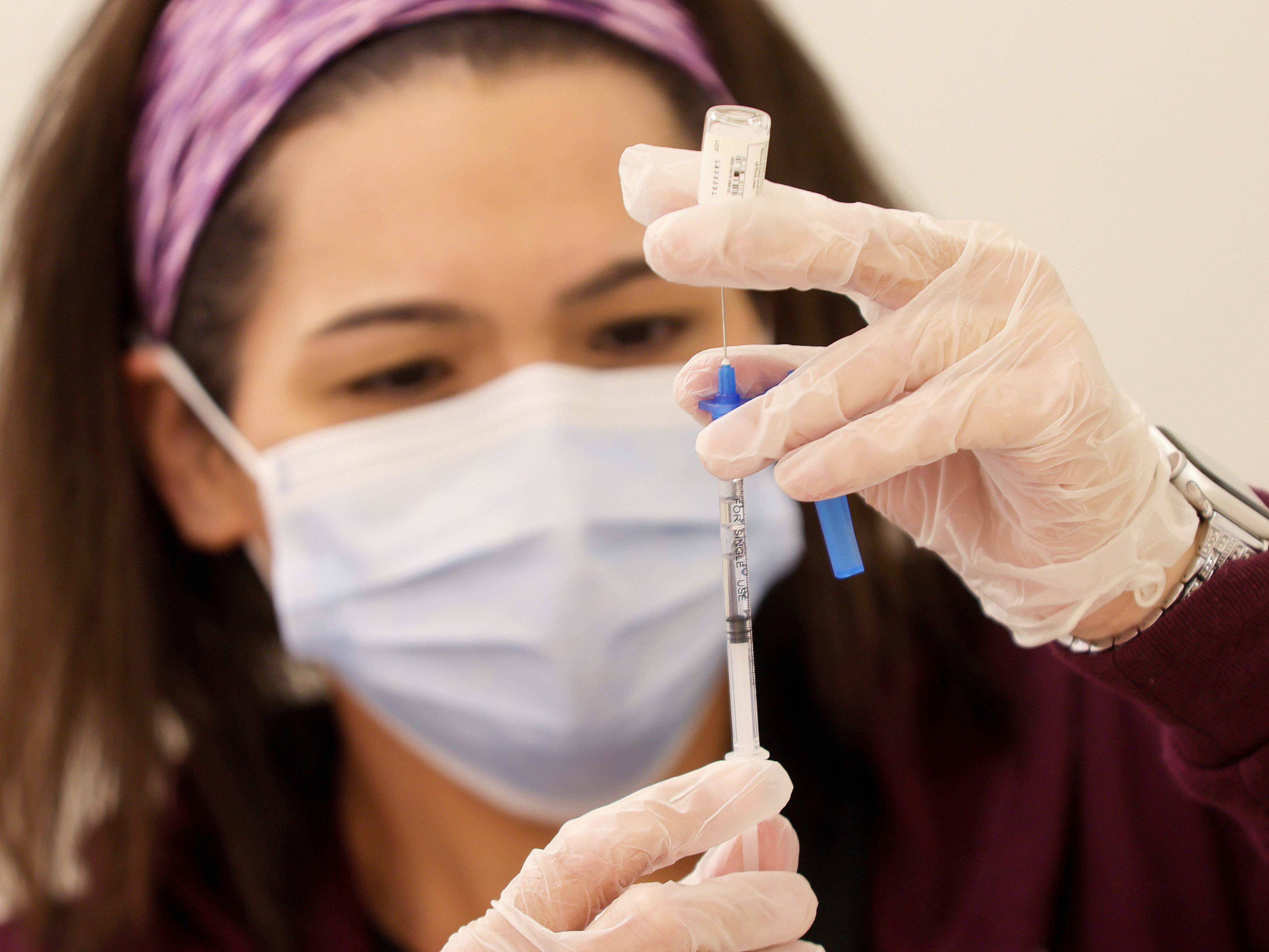 A dose of the new one-shot Johnson & Johnson COVID-19 vaccine is prepared at Baldwin Hills Crenshaw Plaza in South Los Angeles on Wednesday. (Getty Images)