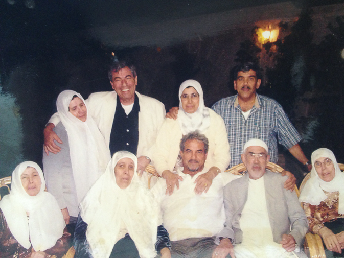 'I Have These Dreams Where I Go Back.' Dad And Daughter Mourn A Syria They Once Knew 1 Walid Sakaan (center, bottom) with most of his 11 siblings in Aleppo, Syria, in 2006.
