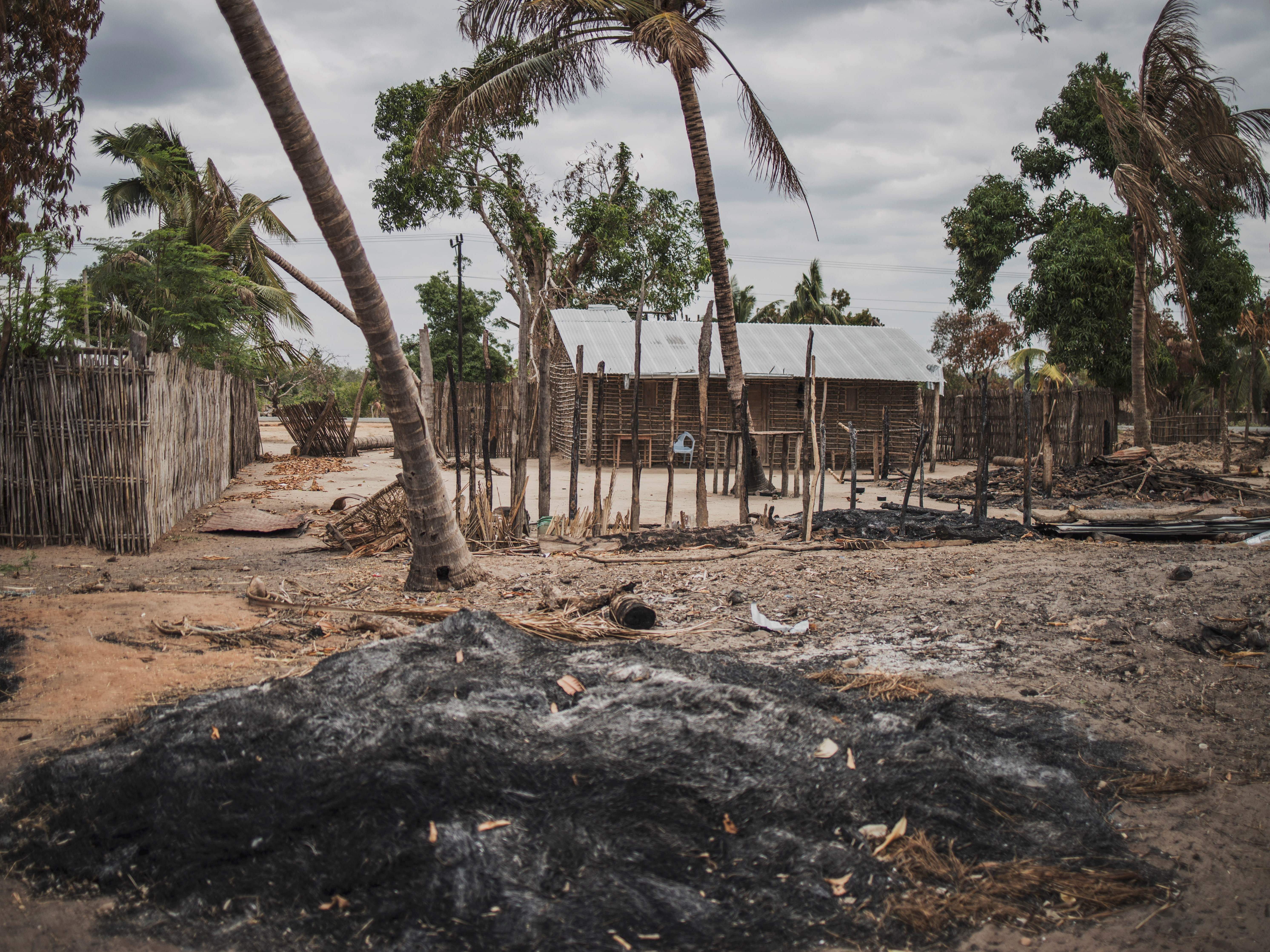 A mound of ashes is seen after an attack in the village of Aldeia da Paz outside Macomia, on Aug. 24, 2019. For the past three years, violence has devastated parts of northern Mozambique, leaving hundreds of thousands displaced. (AFP via Getty Images)