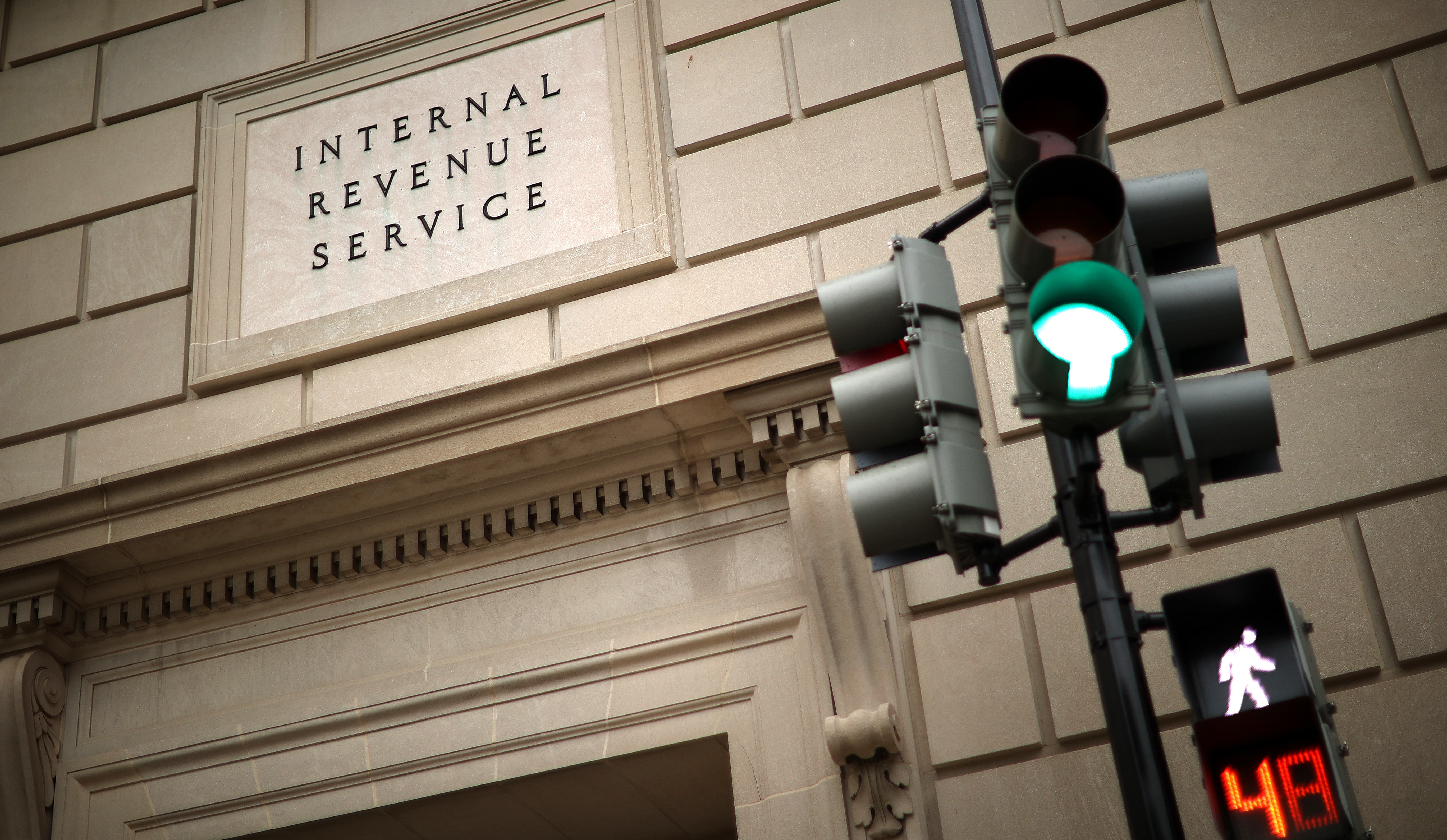 The Internal Revenue Service is pictured in April 2020 in Washington, D.C. The IRS has faced huge challenges in recent years, and new coronavirus relief bills introduce new complexity to the agency's work. (Getty Images)
