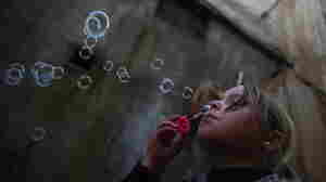 Blowing Bubbles And Running From Bombs: The Reality Of War For The Children Of Syria 