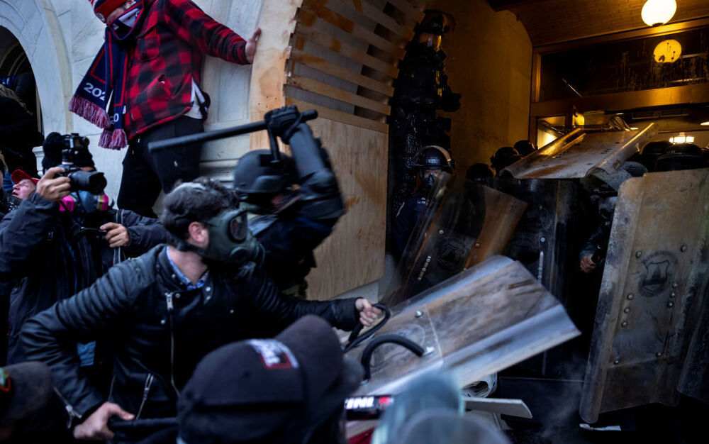 Rioters clash with police and security forces as people try to storm the U.S. Capitol on Jan. 6. The FBI is undertaking an extensive investigation to identify and charge hundreds of individuals. (Getty Images)