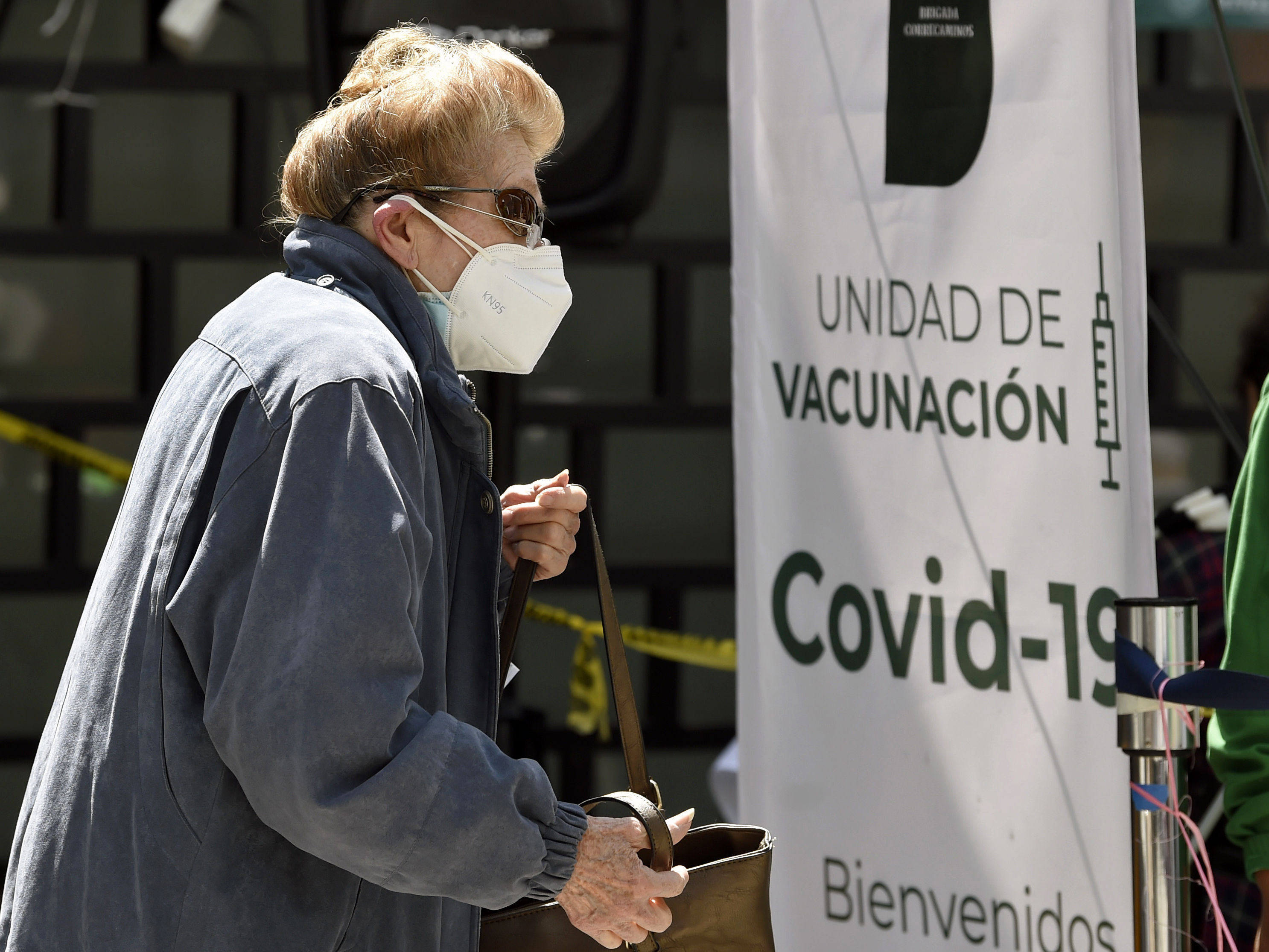 A woman lines up to receive the AstraZeneca vaccine in Mexico City on Feb. 17. (AFP via Getty Images)