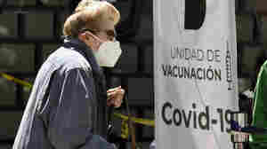 Biden Takes First Jab At Vaccine Diplomacy, Sharing Doses With Mexico, Canada