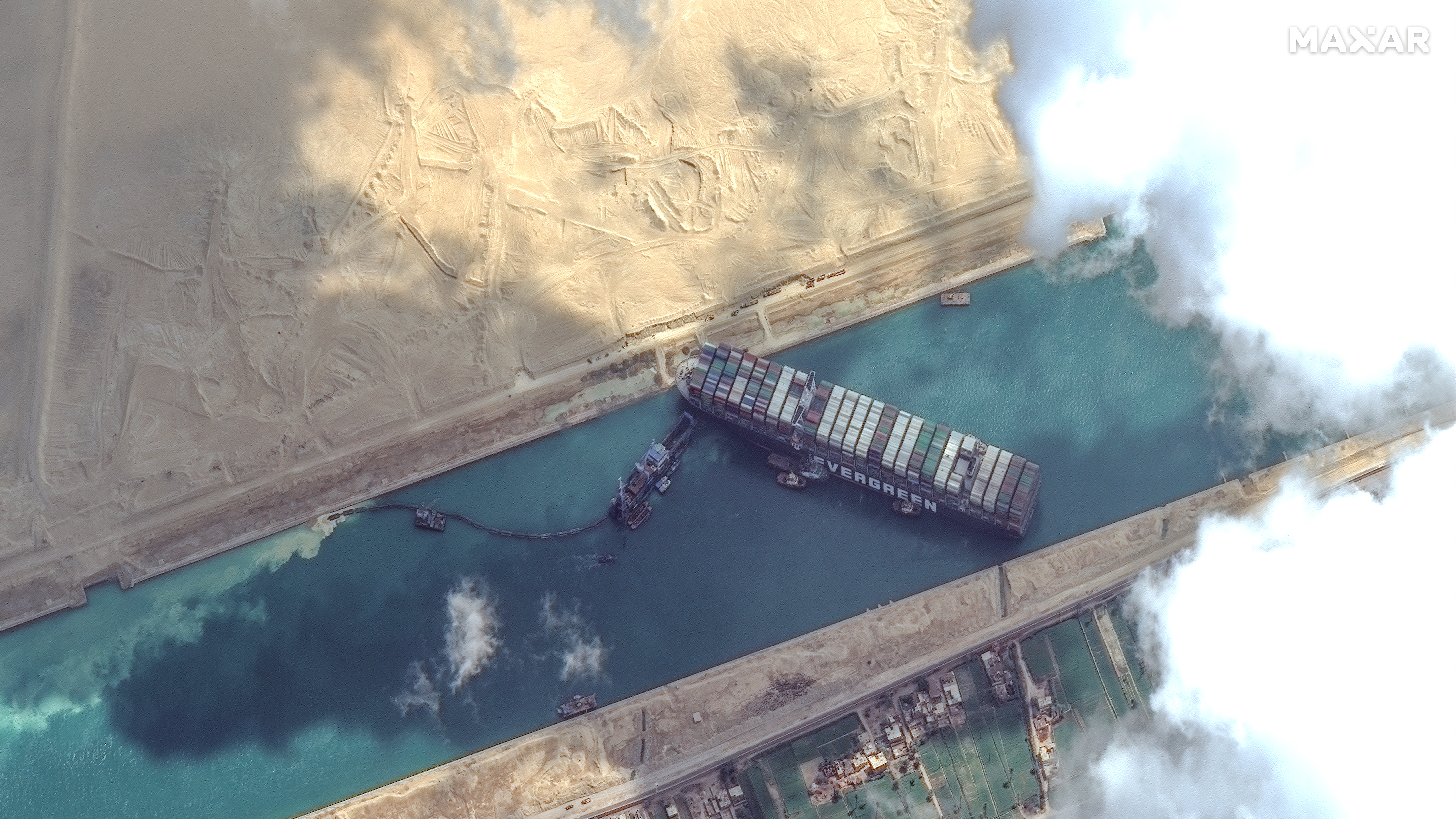 High-resolution satellite imagery shows the Suez Canal and the container ship Ever Given that remains stuck north of the city of Suez, Egypt. (ScapeWare3d/DigitalGlobe/Getty Images)