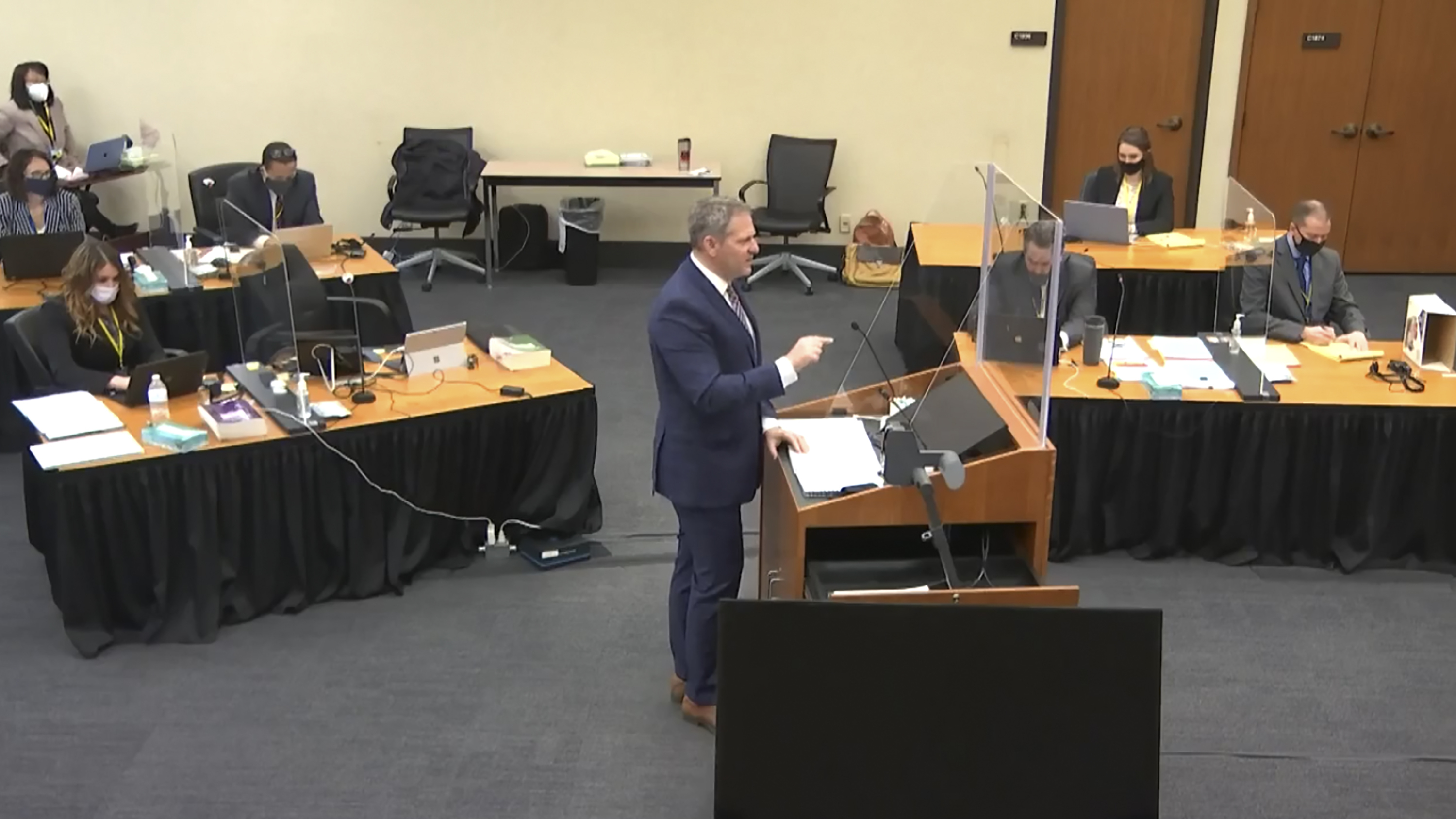 In this screen grab from video, prosecutor Steve Schleicher speaks as Hennepin County Judge Peter Cahill presides over jury selection earlier this month in the trial of former Minneapolis police officer Derek Chauvin in Minneapolis.