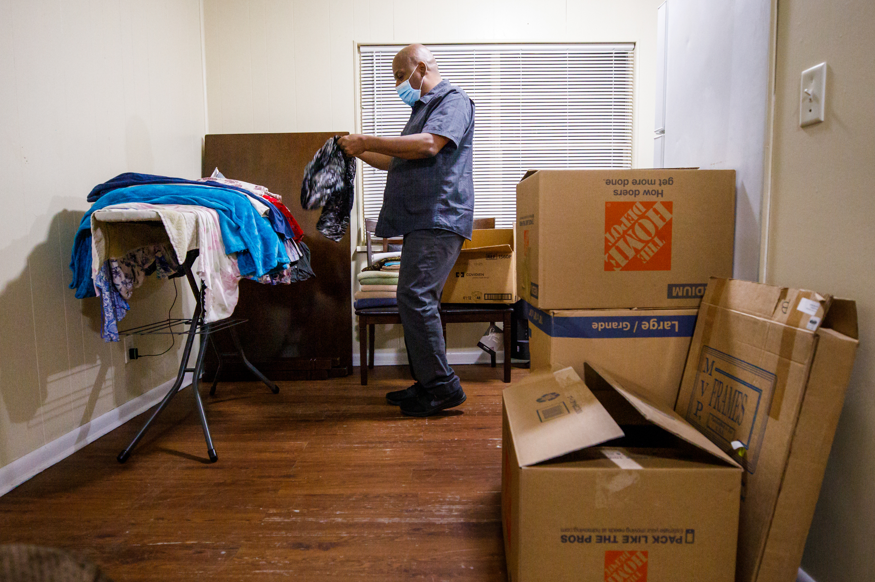 Gregory Curry has had almost all his belongings in boxes and in a storage locker since he was evicted in August. He spent more than seven months struggling to survive financially and unable to find another landlord willing to rent to him. (Colin Hackley for NPR)