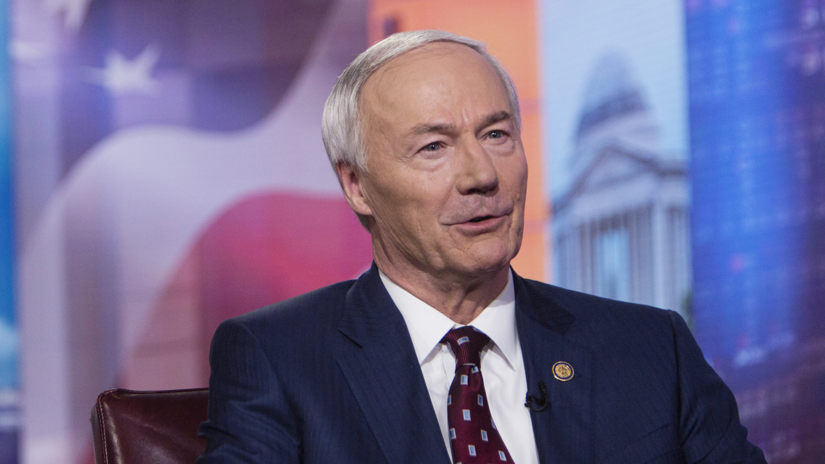 Asa Hutchinson, governor of Arkansas, pictured in 2019, on Monday said the bill on treating transgender youth would set "new standards of legislative interference with physicians and parents as they deal with some of the most complex and sensitive matters involving young people."