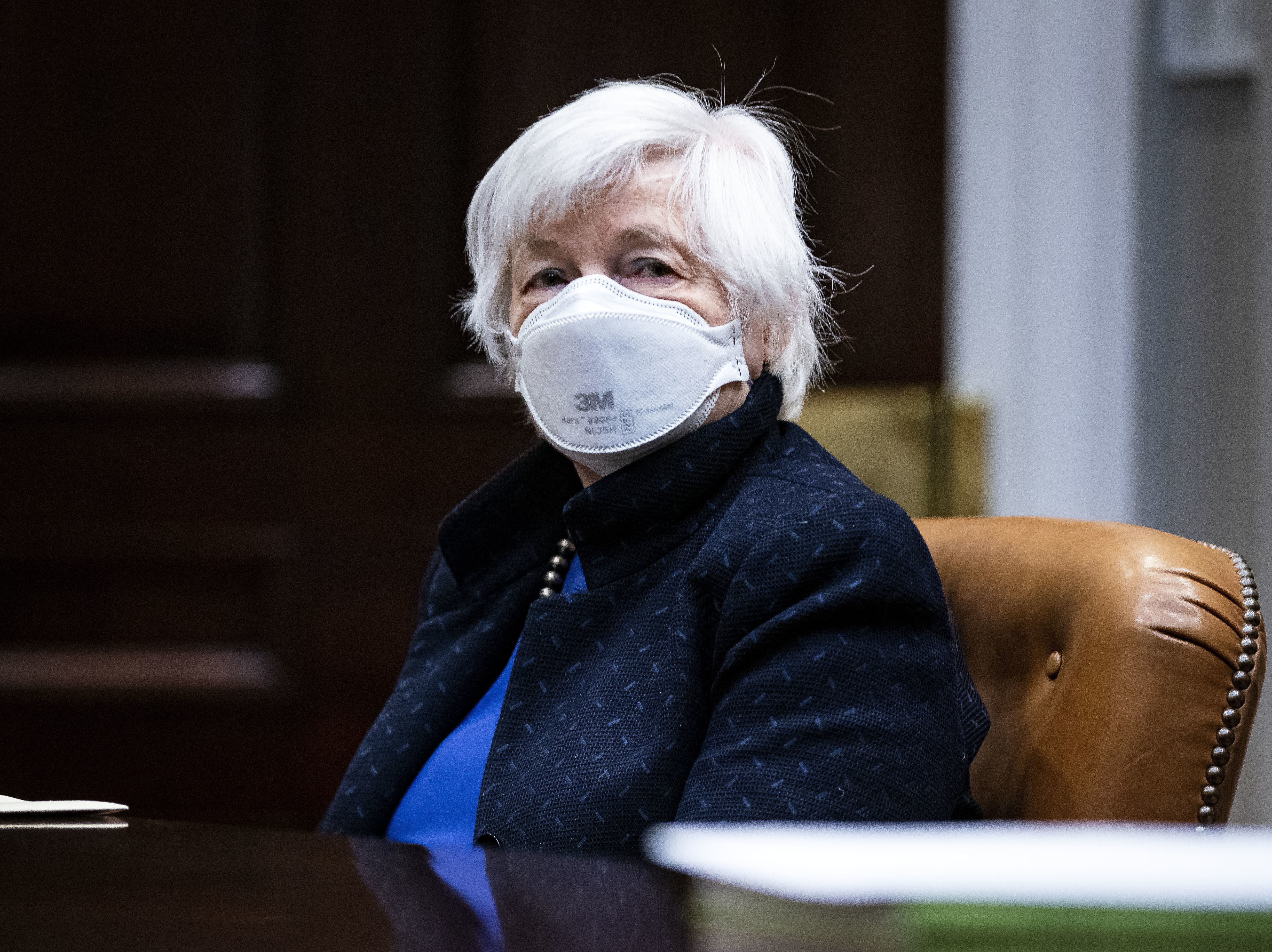 Treasury Secretary Janet Yellen listens during a meeting with President Biden in the White House on March 5. Yellen on Monday proposed a minimum global tax rate for corporations. (Pool/Getty Images)