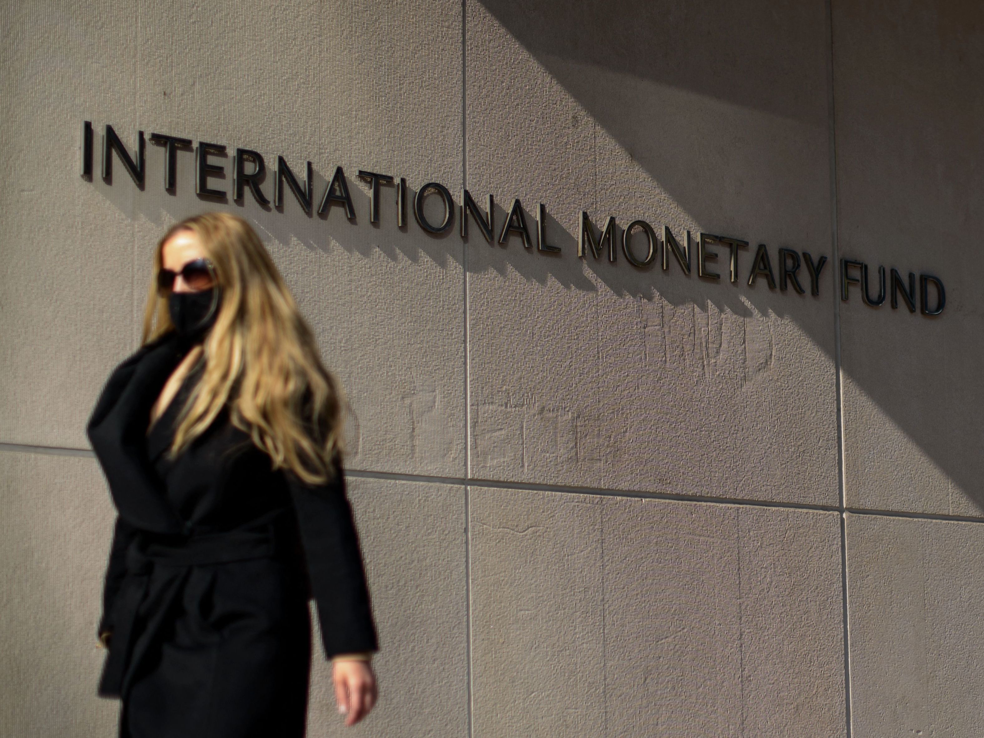 The International Monetary Fund has raised its forecasts for both the U.S. and the global economies, crediting rapid COVID-19 vaccine rollouts and relief efforts. (AFP via Getty Images)