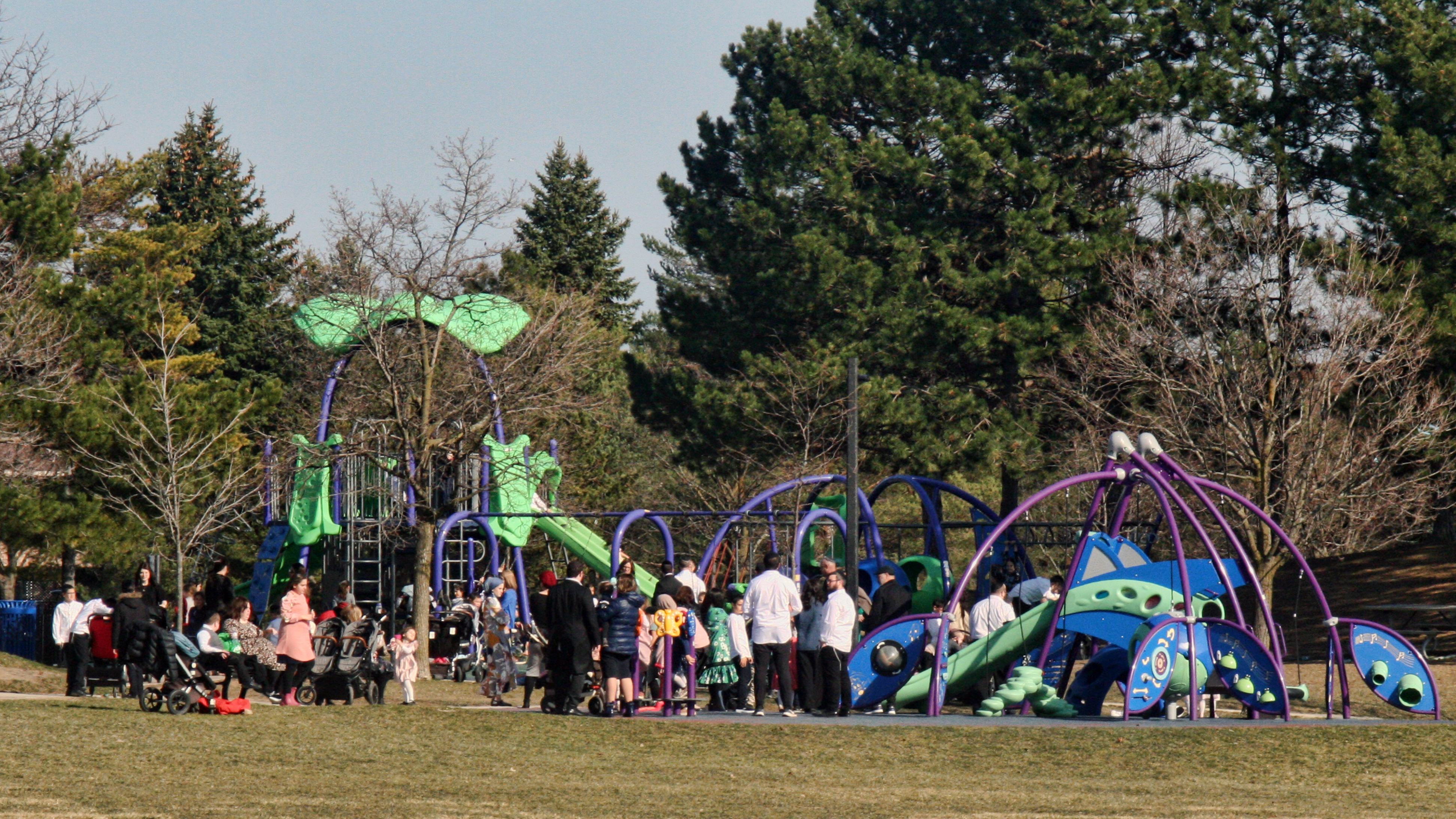 A crowd of parents and children at a playground during the COVID-19 pandemic in Toronto, Ontario, Canada on April 4. The country is experiencing a third wave of the coronavirus pandemic.