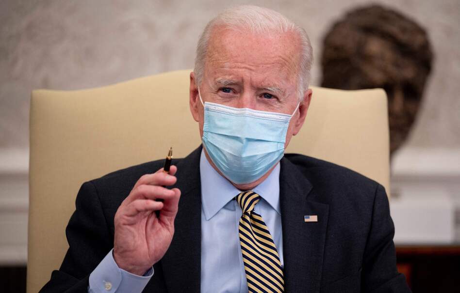 President Joe Biden, pictured in the Oval Office on Friday, released a budget outline that includes $2.1 billion for gun violence prevention. (Jim Watson/AFP via Getty Images)