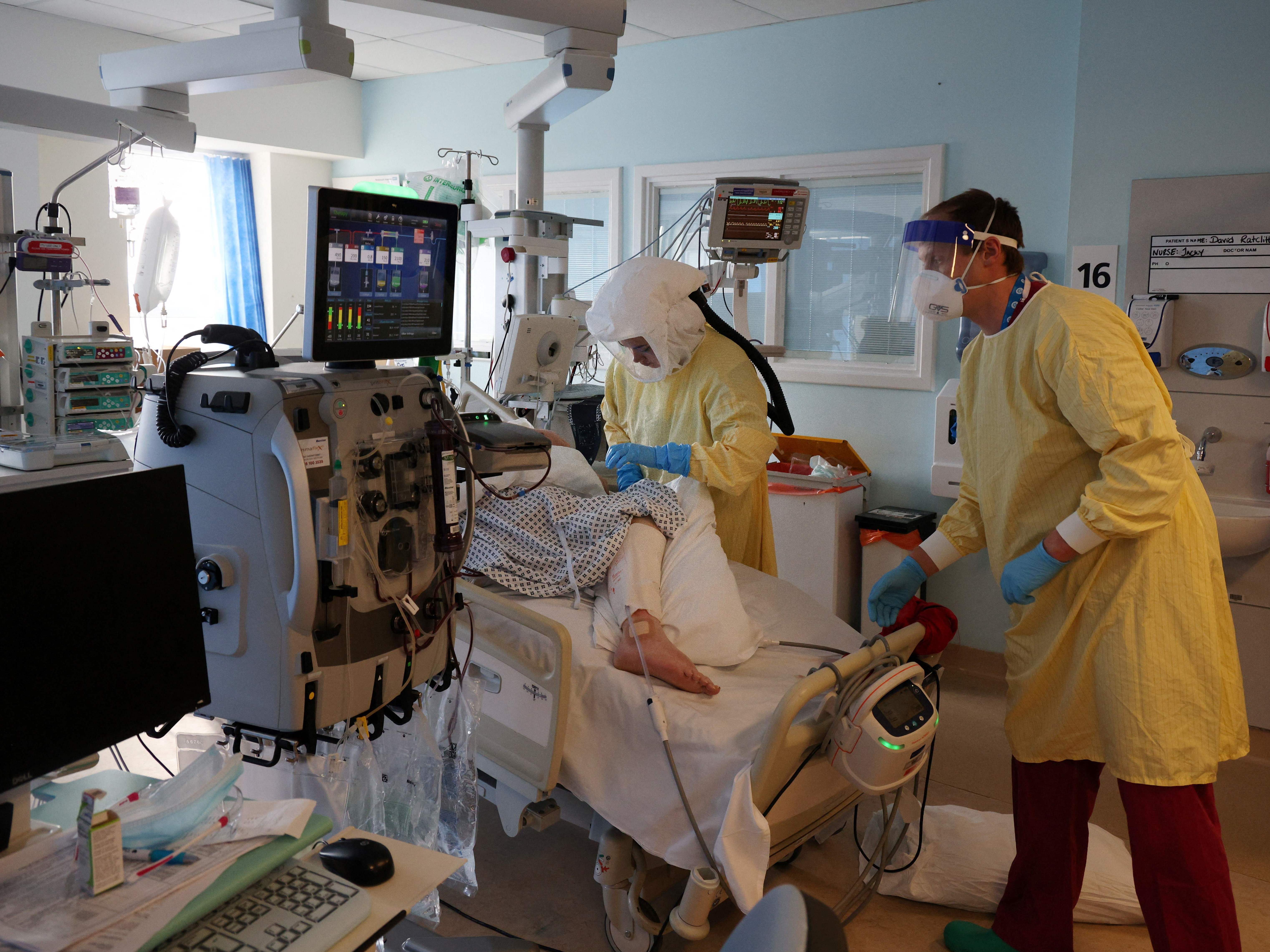 Hospital workers tend to a Covid-19 patient at Queen Alexandra Hospital in Portsmouth, England, last month. Researchers have found that the so-called U.K. variant of the coronavirus isn't more likely to lead to death or severe illness. (AFP via Getty Images)