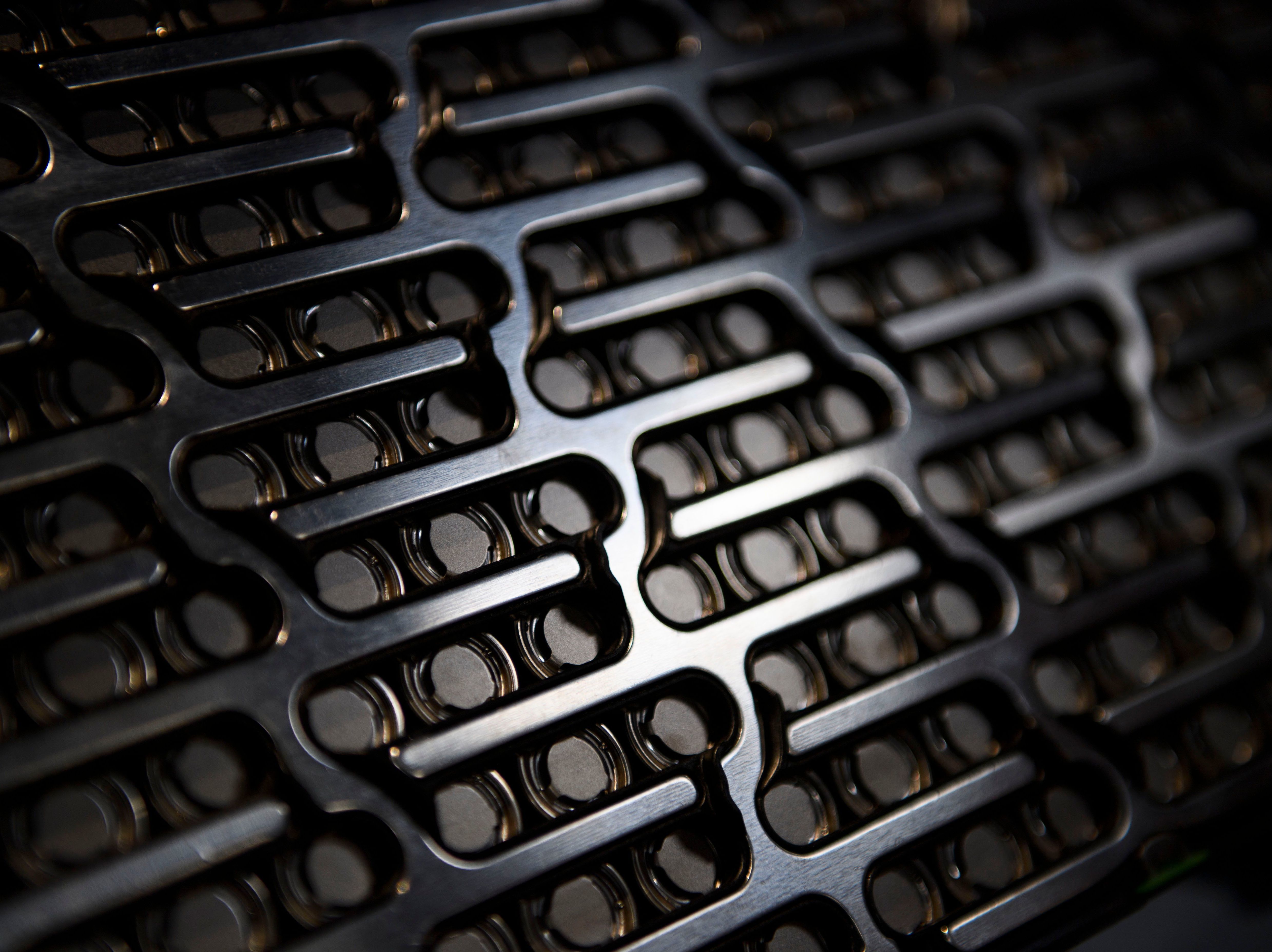 Fears are rising about whether supplies of batteries can keep up with the expected surge in the production of electric vehicles. Pictured here is a close-up of individual battery cells contained in a battery pack module for a Lucid Motors electric vehicle. (AFP via Getty Images)