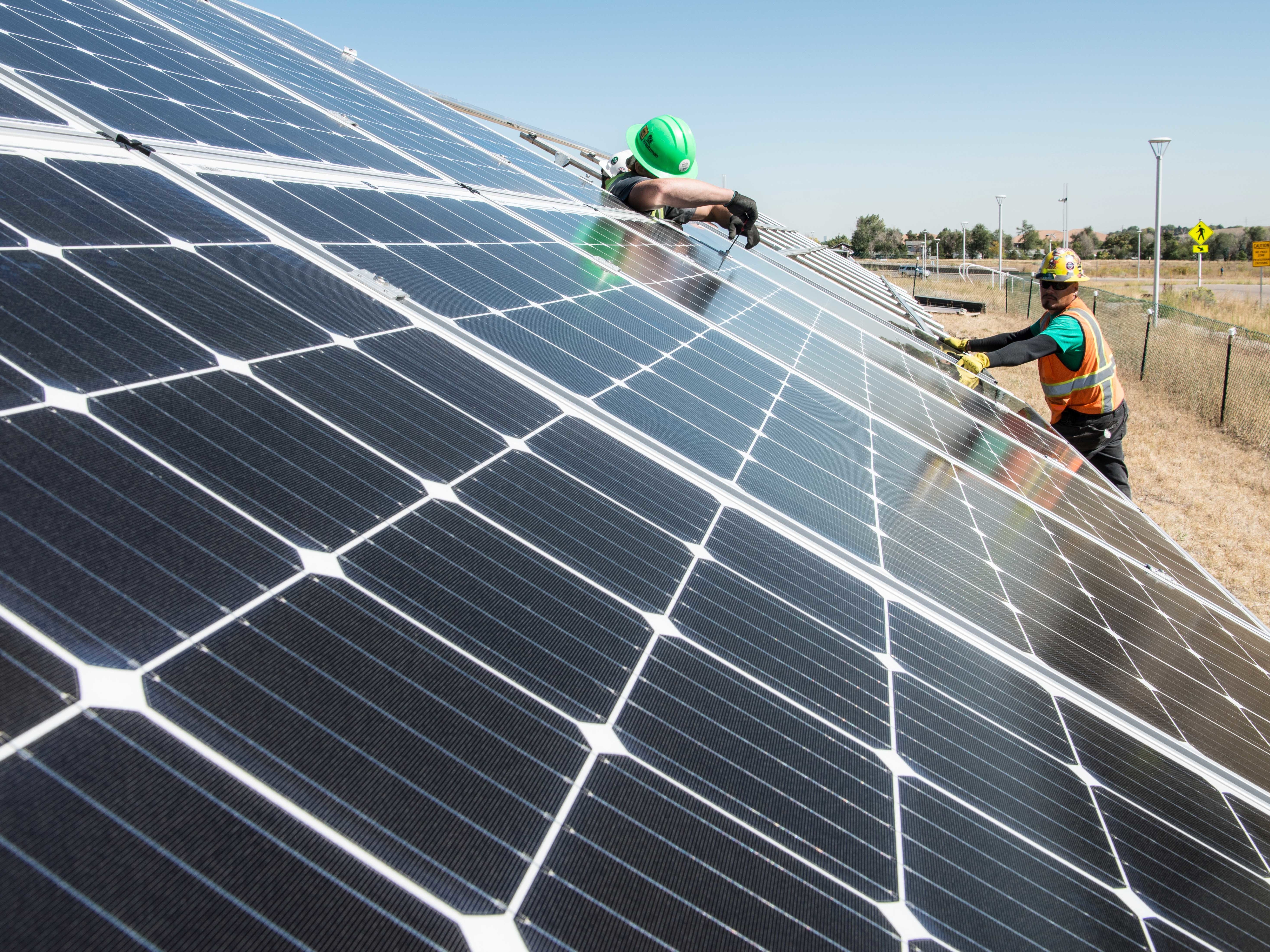 To cut carbon emissions, President Biden announced an initiative to further cut the cost of solar installations, like this one being tested at the National Renewable Energy Laboratory in Colorado. (NREL)