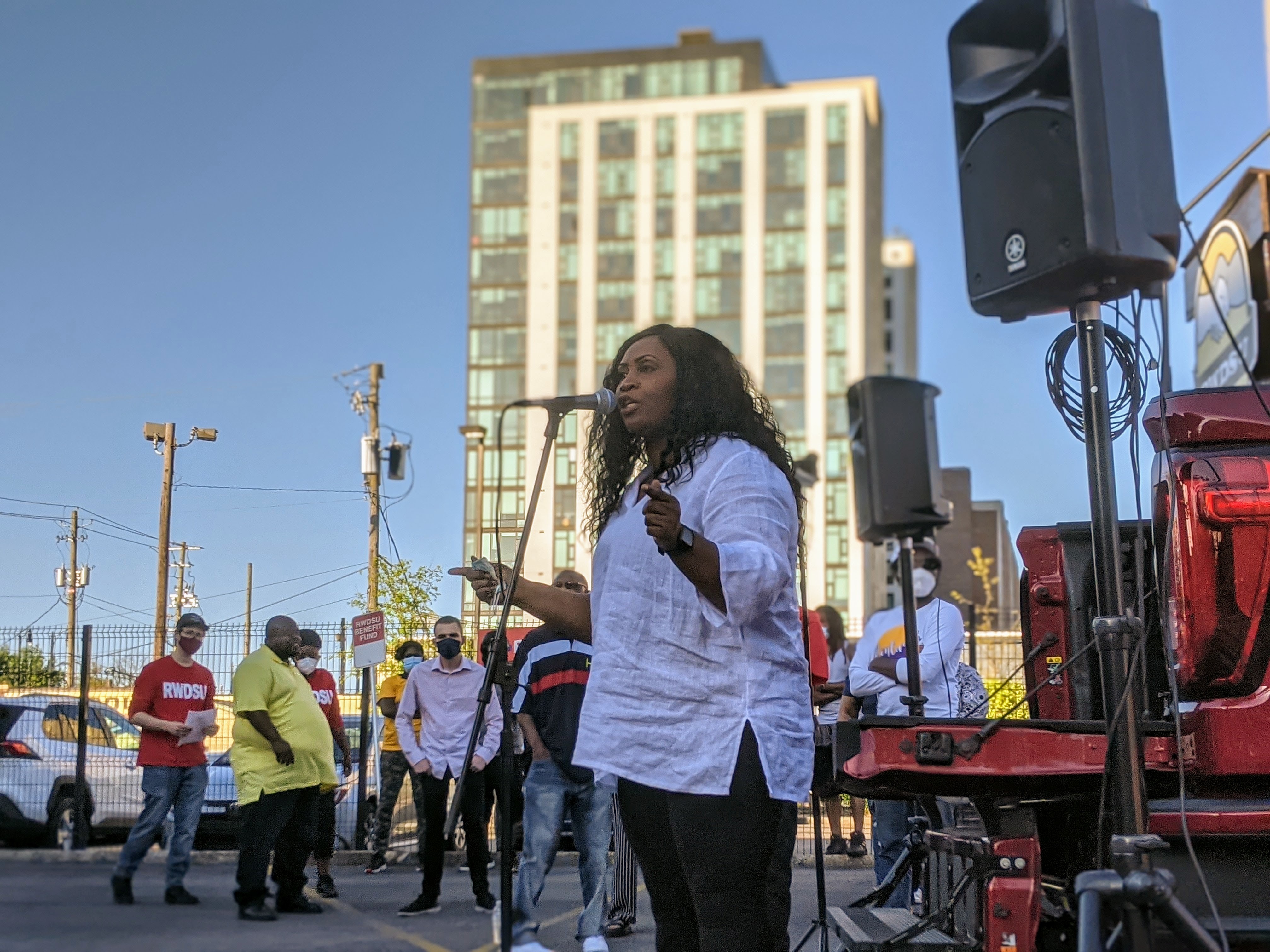 Pro-union Amazon warehouse worker Jennifer Bates vows at a rally in Birmingham to keep fighting to unionize the Amazon Bessemer warehouse. (Stephan Bisaha for NPR)