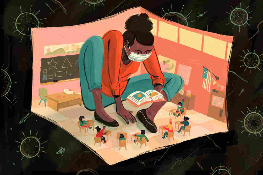 A masked teacher sits squeezed in a classroom with her students.