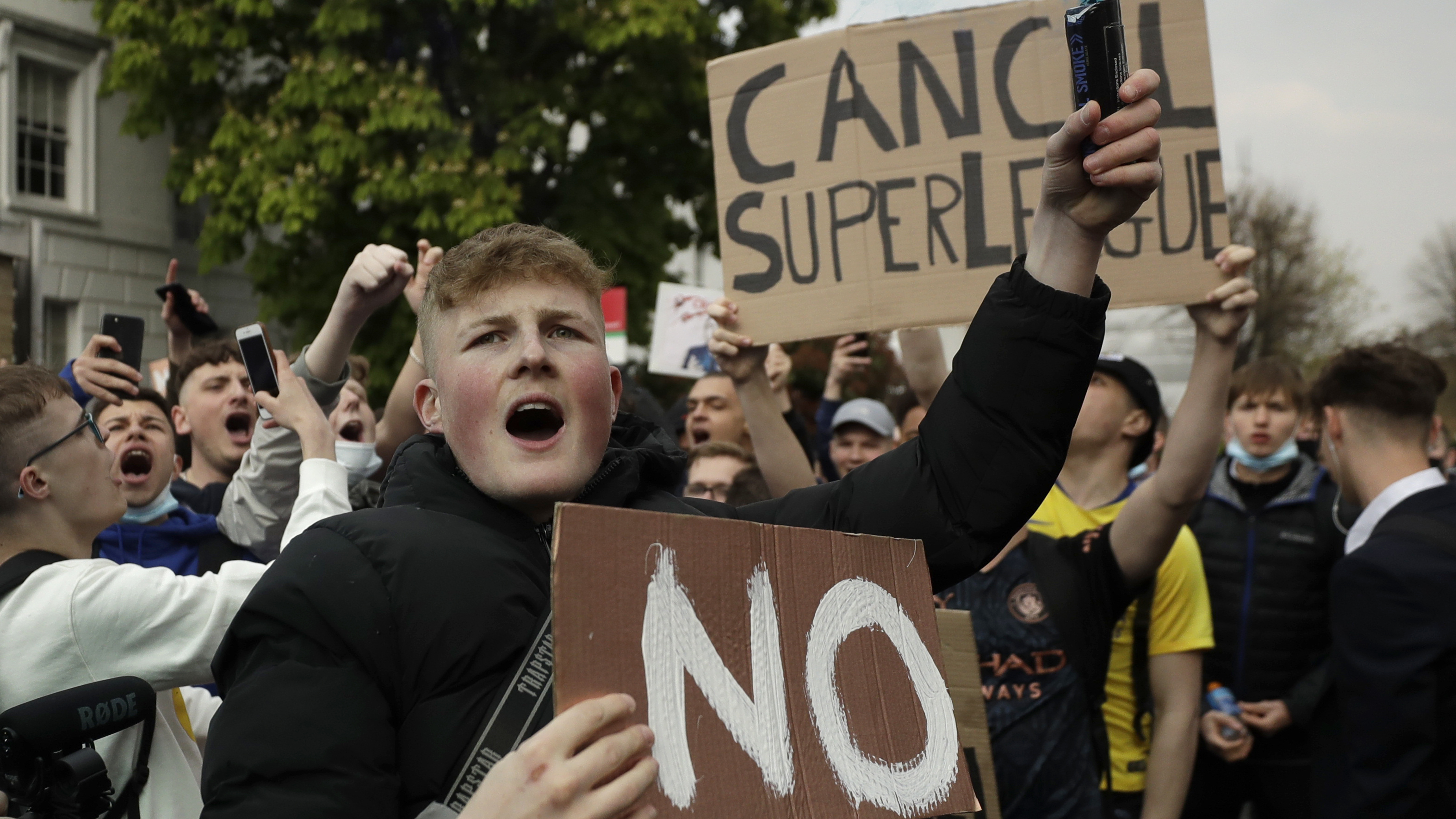 Chelsea fans protest outside Stamford Bridge stadium in London, against Chelsea