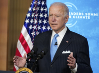 President Biden speaks to world leaders during a virtual climate summit on Friday from the East Room of the White House. The event was part of an effort to restore U.S. leadership on environmental issues after the Trump administration pulled back.