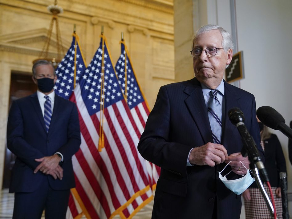 Senate Minority Leader Mitch McConnell, R-Ky., joined by Senate Minority Whip John Thune, R-S.D., left, has argued that President Biden is not governing like the moderate he campaigned as in 2020. (J. Scott Applewhite/AP)
