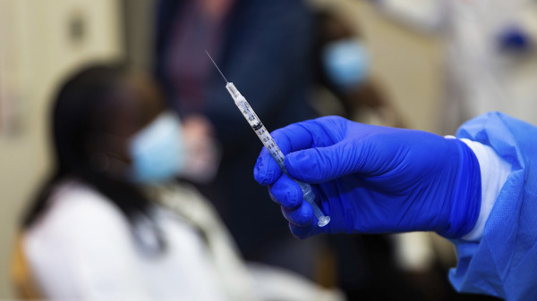 A doctor prepares to administer a vaccine injection at New York-Presbyterian Lawrence Hospital in Bronxville, N.Y., in January. The FDA has approved emergency use authorization of the Pfizer/BioNTech vaccine for patients age 12-15.