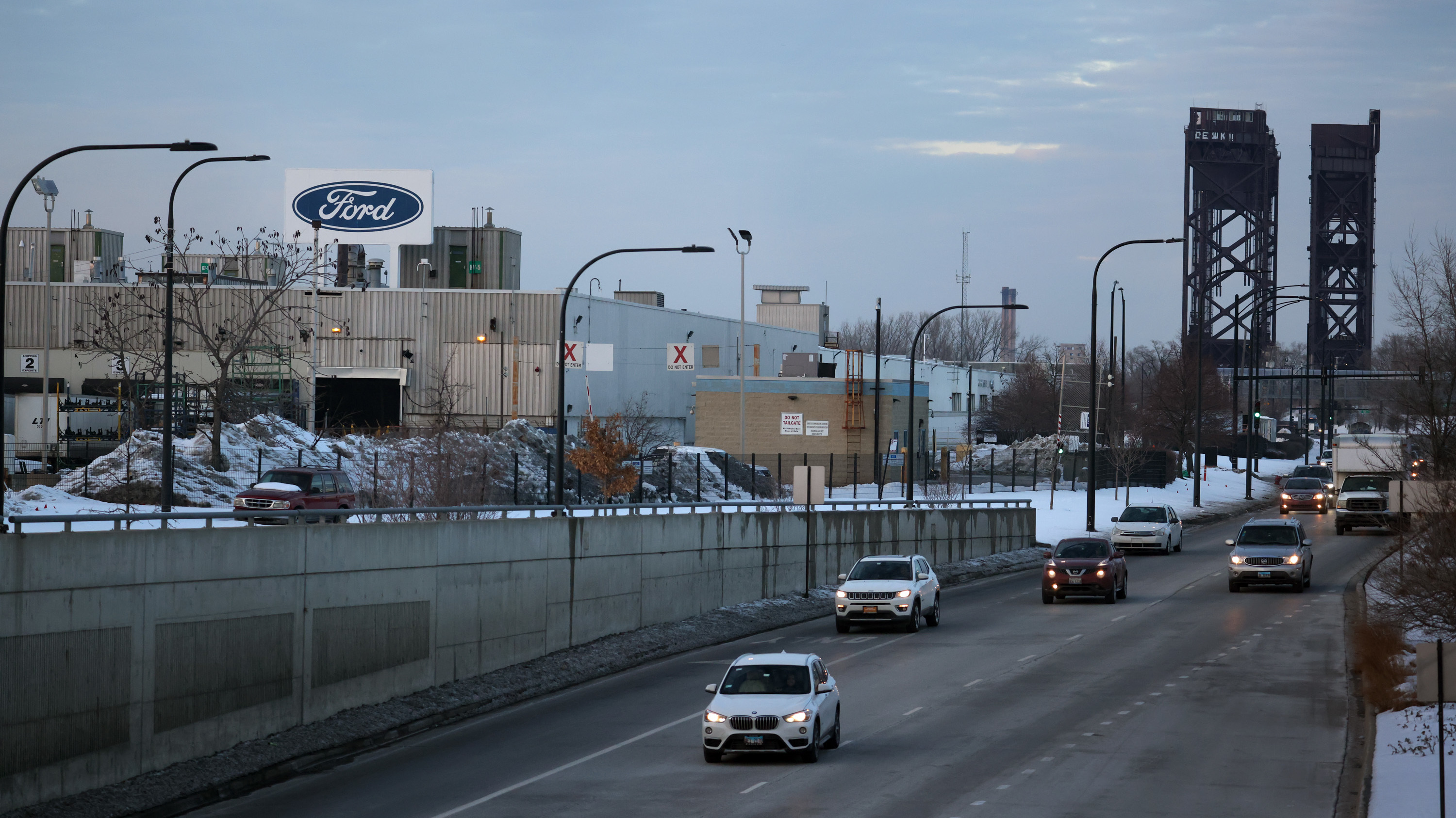 The Ford company logo is displayed above the Chicago Assembly Plant on Feb. 3. Ford is allowing many workers to work remotely — not just during the pandemic, but as routine policy. But of course, plant workers can't sign in to work from home. (Getty Images)