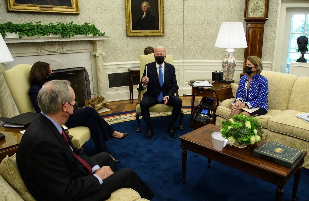 President Biden and Vice President Harris meet with Republican Sens. Shelley Moore Capito of West Virginia and Mike Crapo of Idaho to discuss an infrastructure bill in the Oval Office at the White House on Thursday. (AFP via Getty Images)