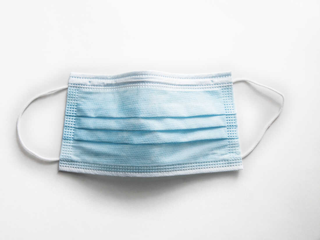Surgical mask on white background