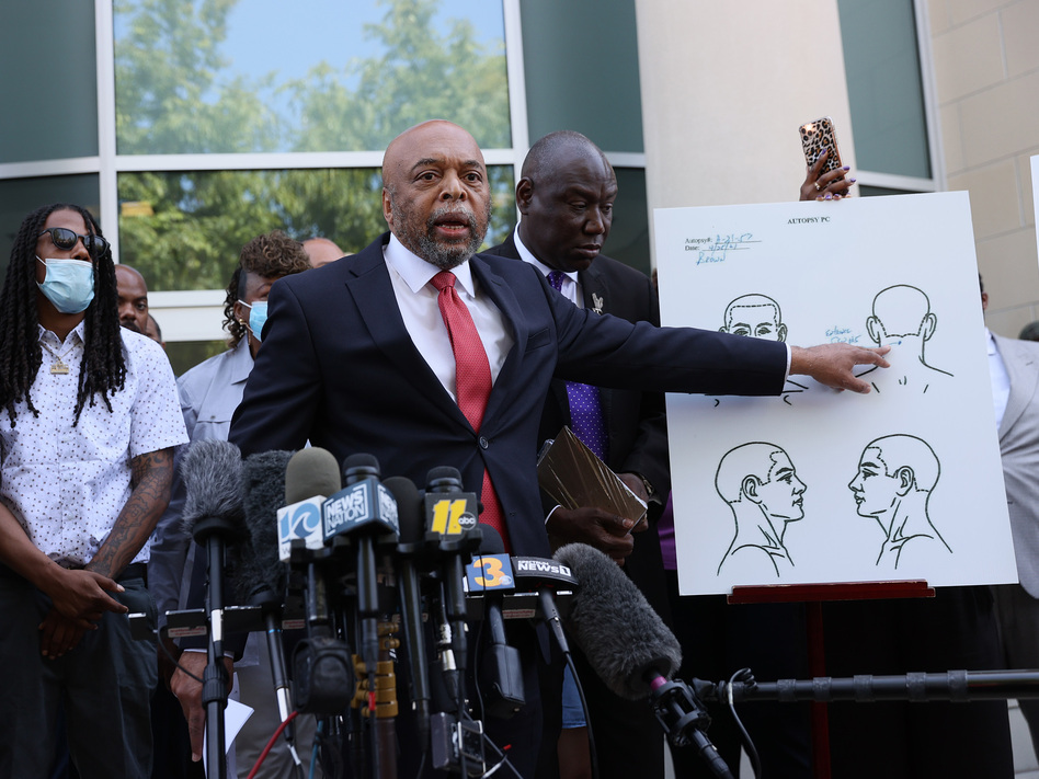 Speaking to reporters on April 27 in Elizabeth City, N.C., Wayne Kendall, one of the lawyers representing the family of Andrew Brown Jr., points to an autopsy chart showing where Brown was shot. (Joe Raedle/Getty Images)