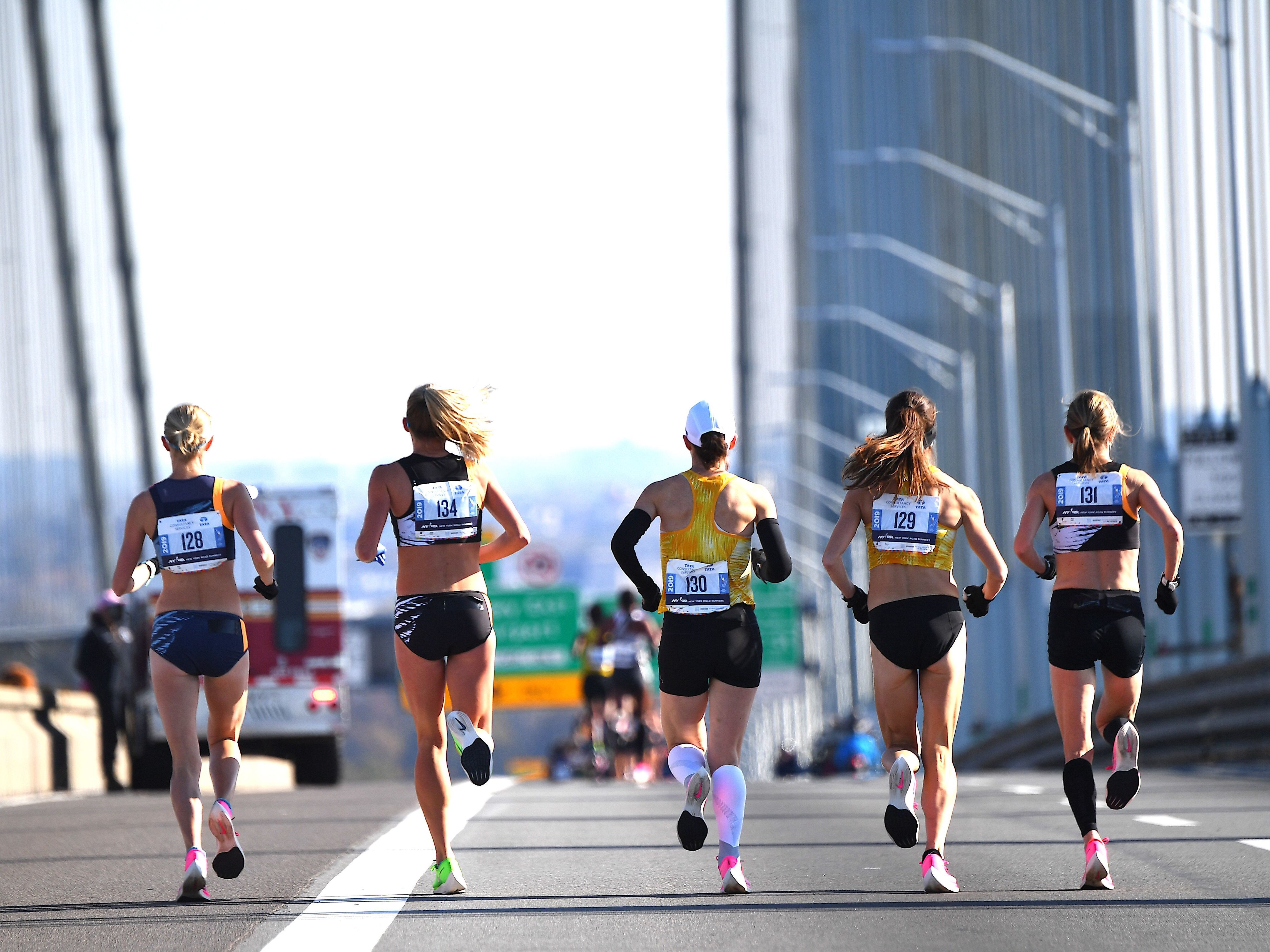 A group of runners compete in the New York City Marathon in 2019. It's one of many big city races to return this year after they were cancelled over pandemic health restrictions in 2020. (AFP via Getty Images)