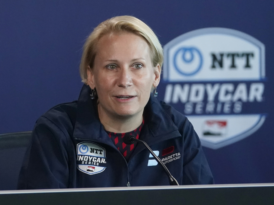 Team owner Beth Paretta speaks during a news conference at the Indianapolis Motor Speedway, on Jan. 19. 'There have been women that have been mechanics that had to hide the fact that they were women, had to wear bandanas over their hair so that ... people wouldn't be heckling them,' she says.