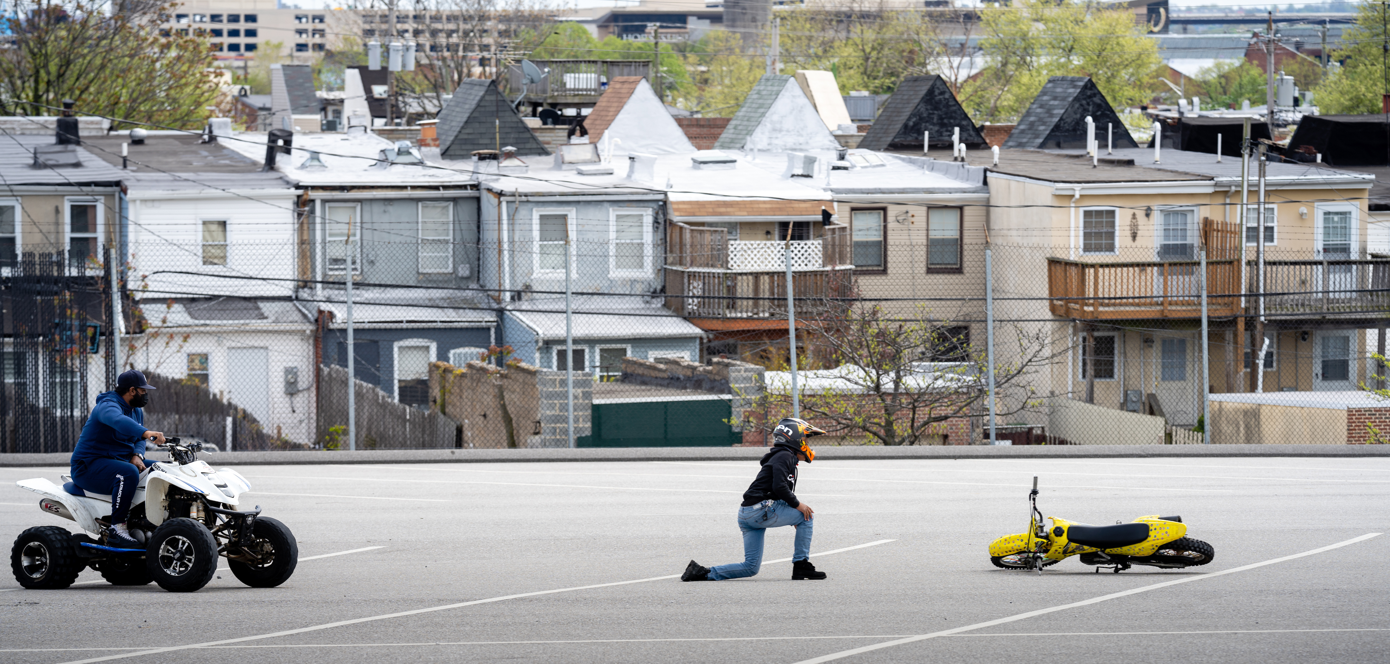 A Baltimore Youth Program Mixes A Passion For Dirt Bikes With Science 5 Instructor Harold Toms checks on Tristan Tremble, 14, after he fell off his bike while attempting a wheelie.