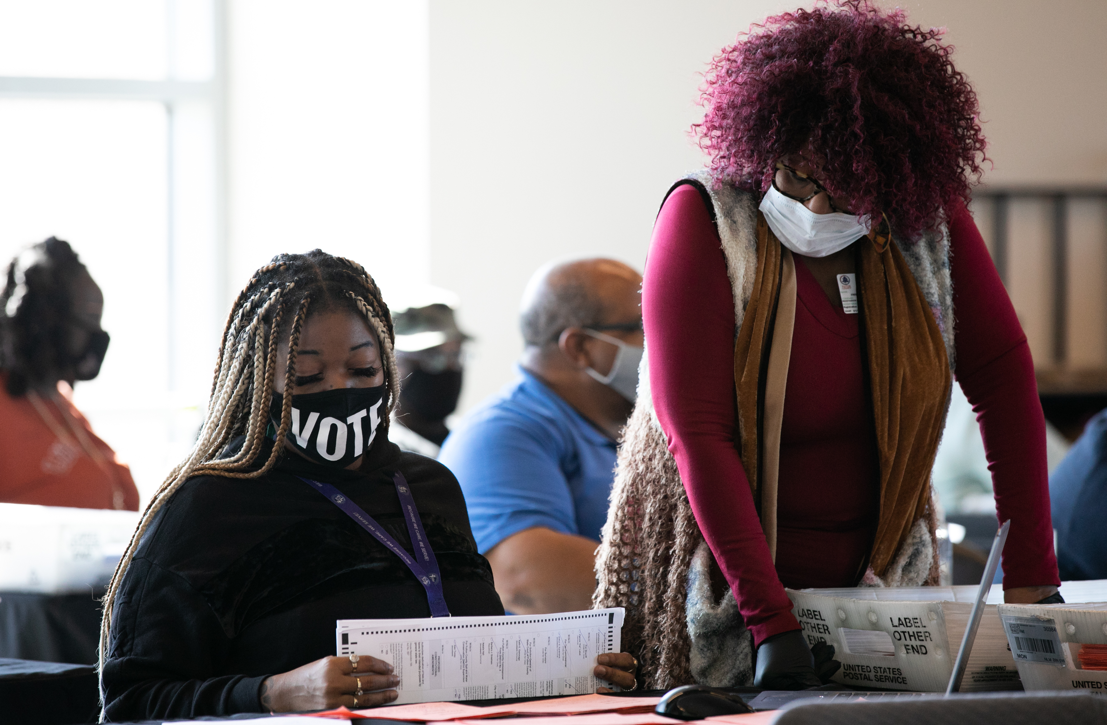 Fulton County workers count absentee ballots on Nov. 6, 2020, in Atlanta. A judge's order marks the latest challenge for the county in a seemingly never-ending election cycle. (Getty Images)