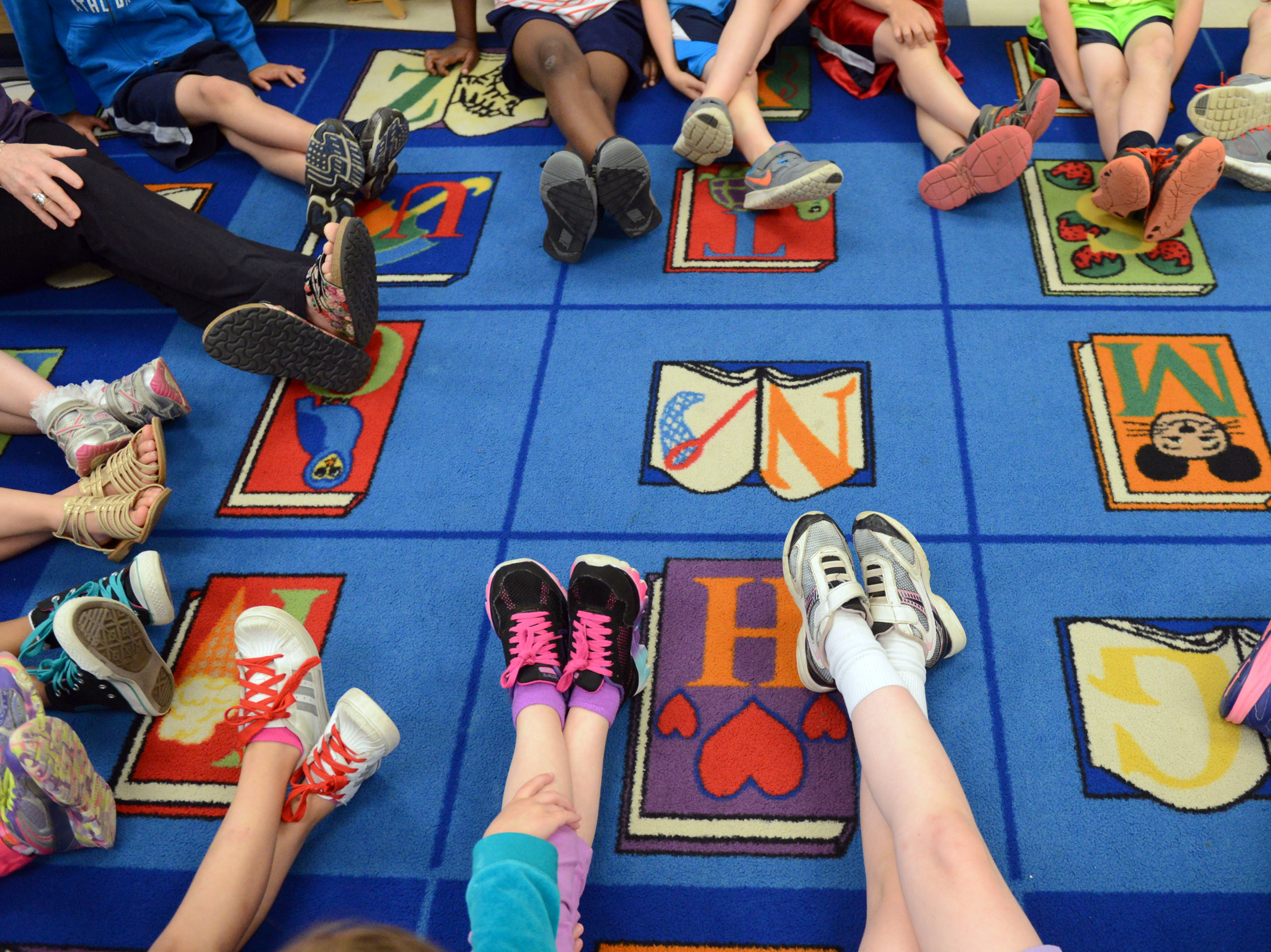 The new law will allow Alabama public schools to offer yoga for students. Here, kids participate in a yoga class in Pennsylvania. (MediaNews Group/Reading Eagle via Getty Images)