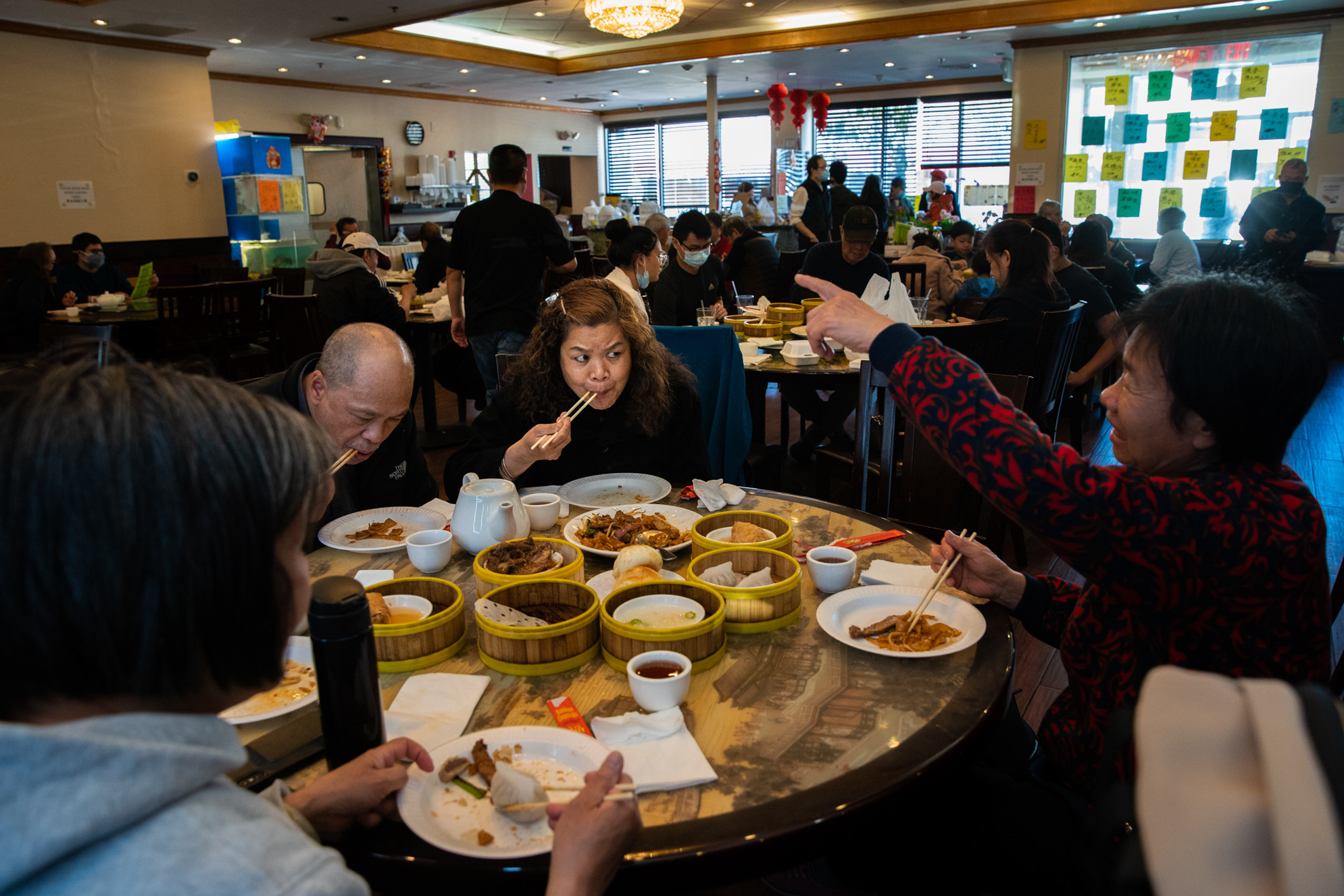 Photos: 2 Cantonese Women Share Their Immigrant Journey 8 On weekends, Liang goes to Quincy where most of her friends live. They usually have Cantonese dim sum together at a local restaurant. After dim sum, she shops in the nearby supermarket, preparing for the week's meals. Here, she has dim sum with her friends at East Ocean in Quincy after not seeing them since the start of the pandemic.