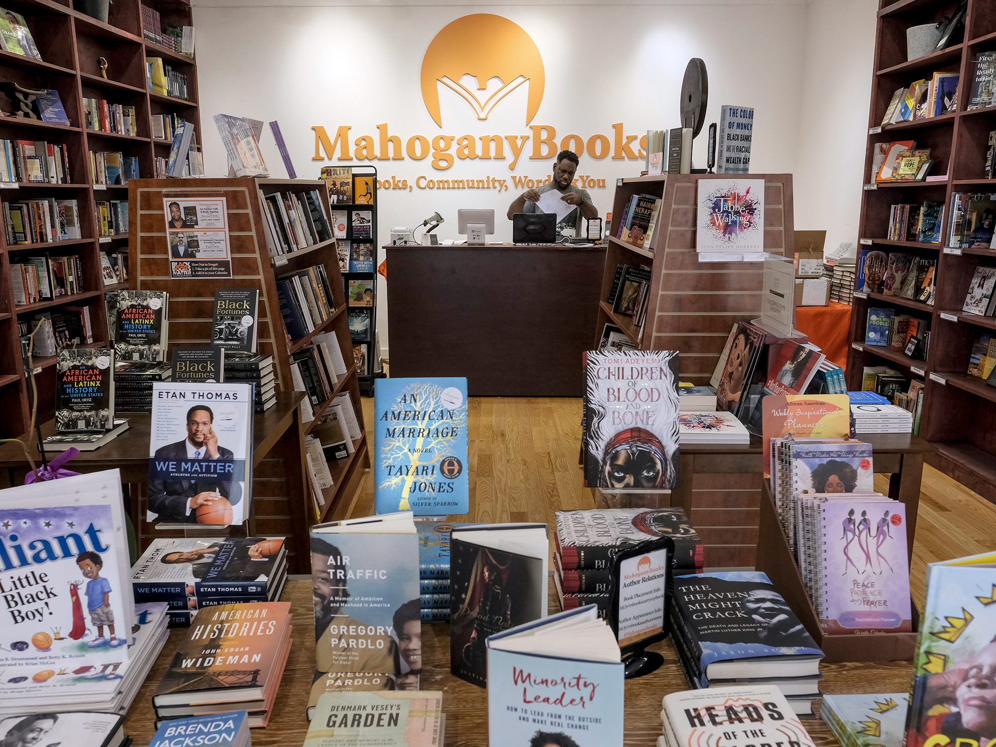 Derrick Young, co-owner of Mahogany Books in Washington, D.C., says his store has seen new customers in the last year who seem to be &quot;willing to do the work&quot; to educate themselves on issues of race in America. (Getty Images)