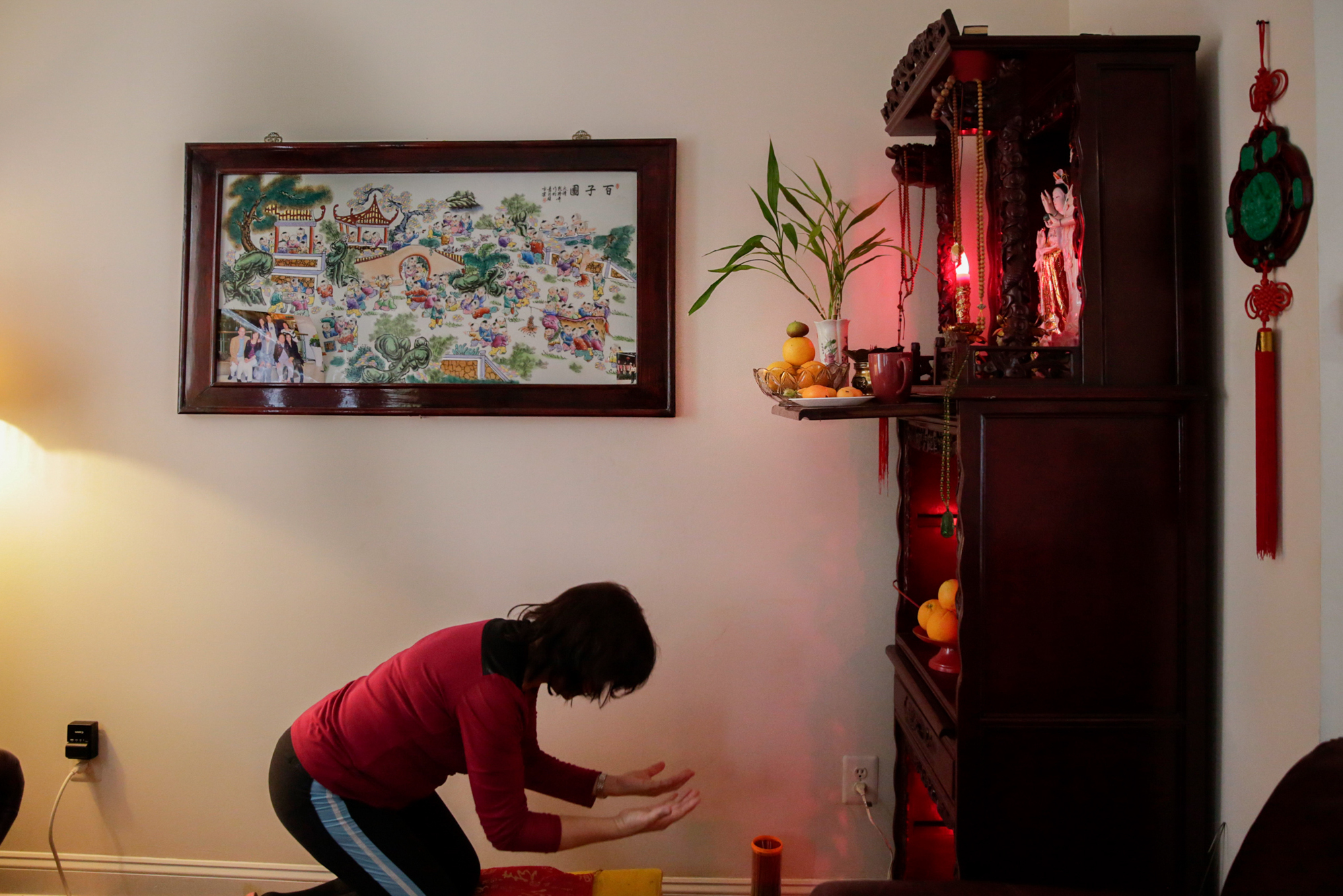 Photos: 2 Cantonese Women Share Their Immigrant Journey 11 Lai's faith in Buddhism manifests in her daily life and gives her strength during tough times. "I have been praying with my mother since I was a girl," Lai says. "I still carry the same Buddha statue with me I had in Guangzhou."