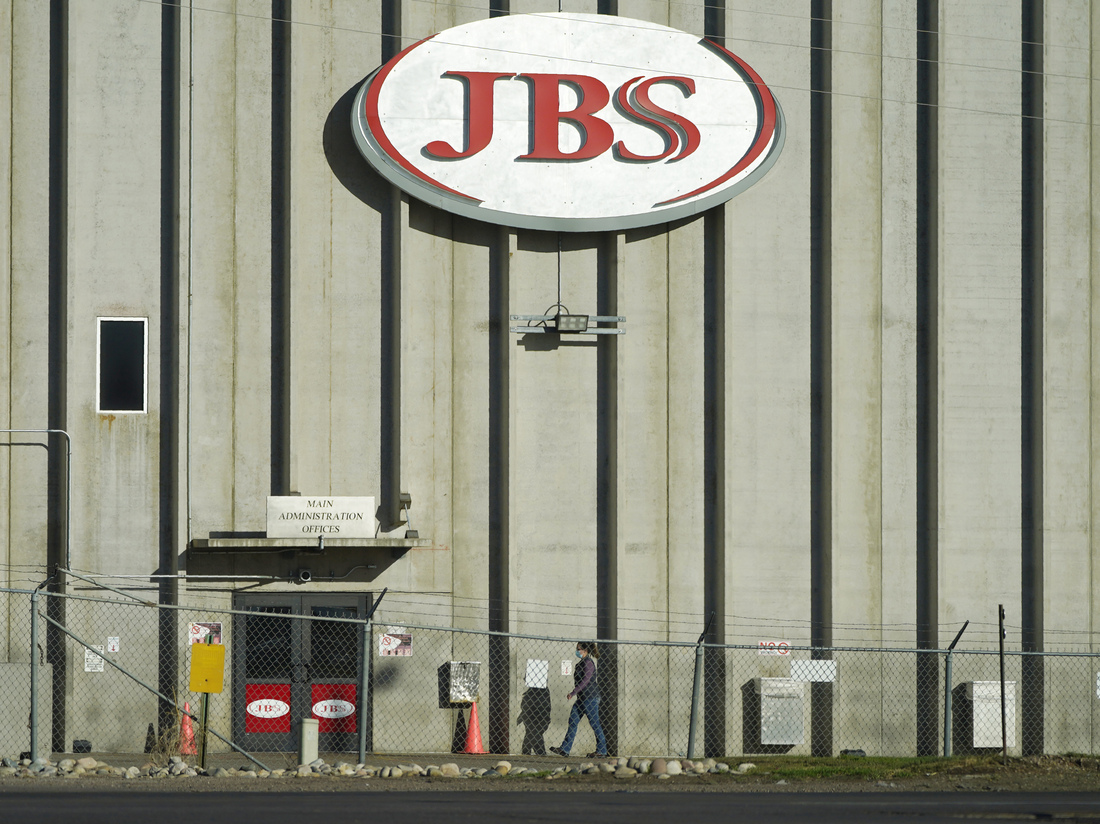 REvil, A Notorious Ransomware Gang, Was Behind JBS Cyberattack, The FBI Says : NPR REvil, A Notorious Ransomware Gang, Was Behind JBS Cyberattack, The FBI Says : NPR
