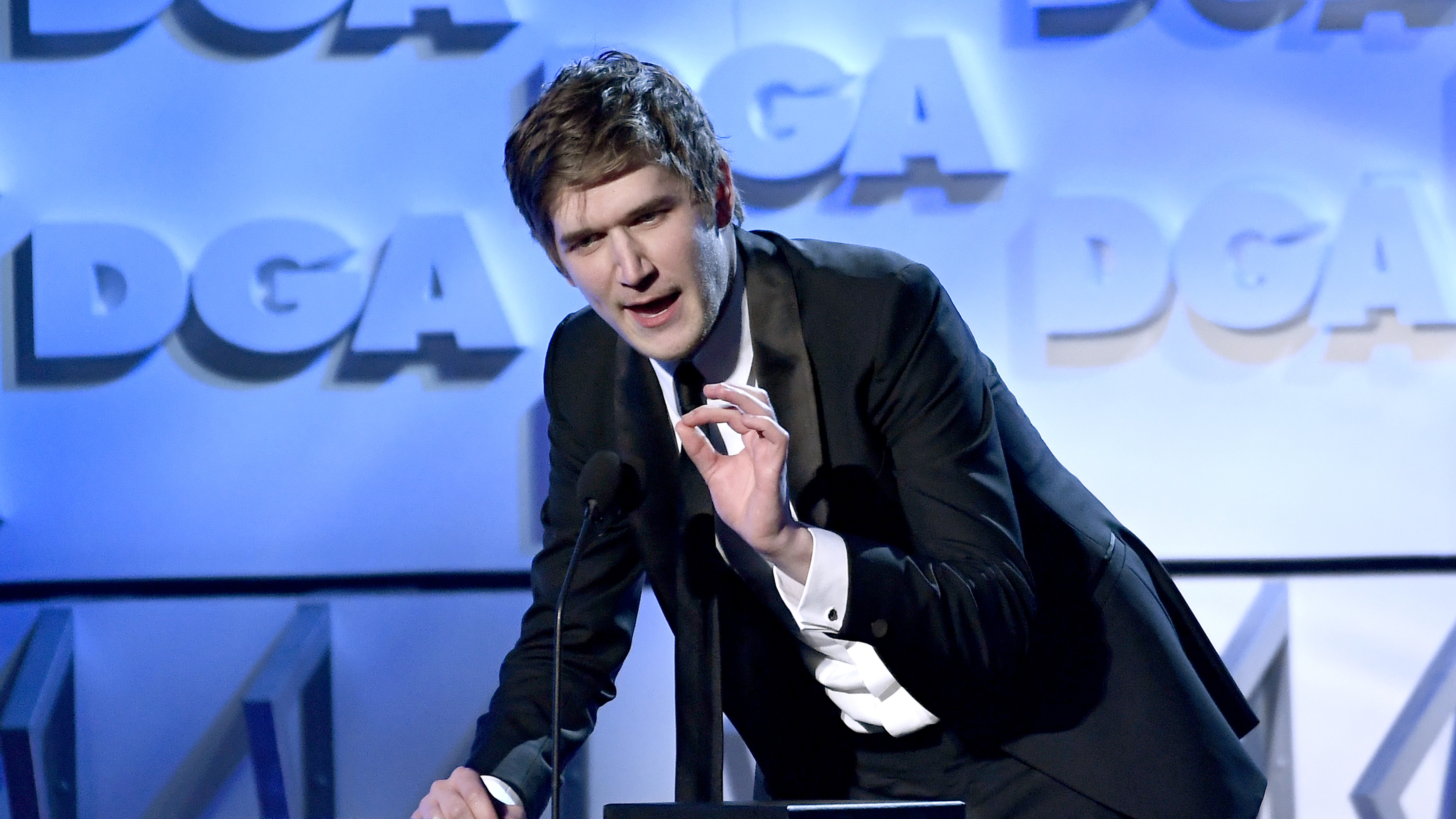 Bo Burnham, seen here accepting a DGA First-Time Feature Film Award for <em>Eighth Grade </em>in 2019, has a new special that places him in a much quieter space. (Getty Images for DGA)