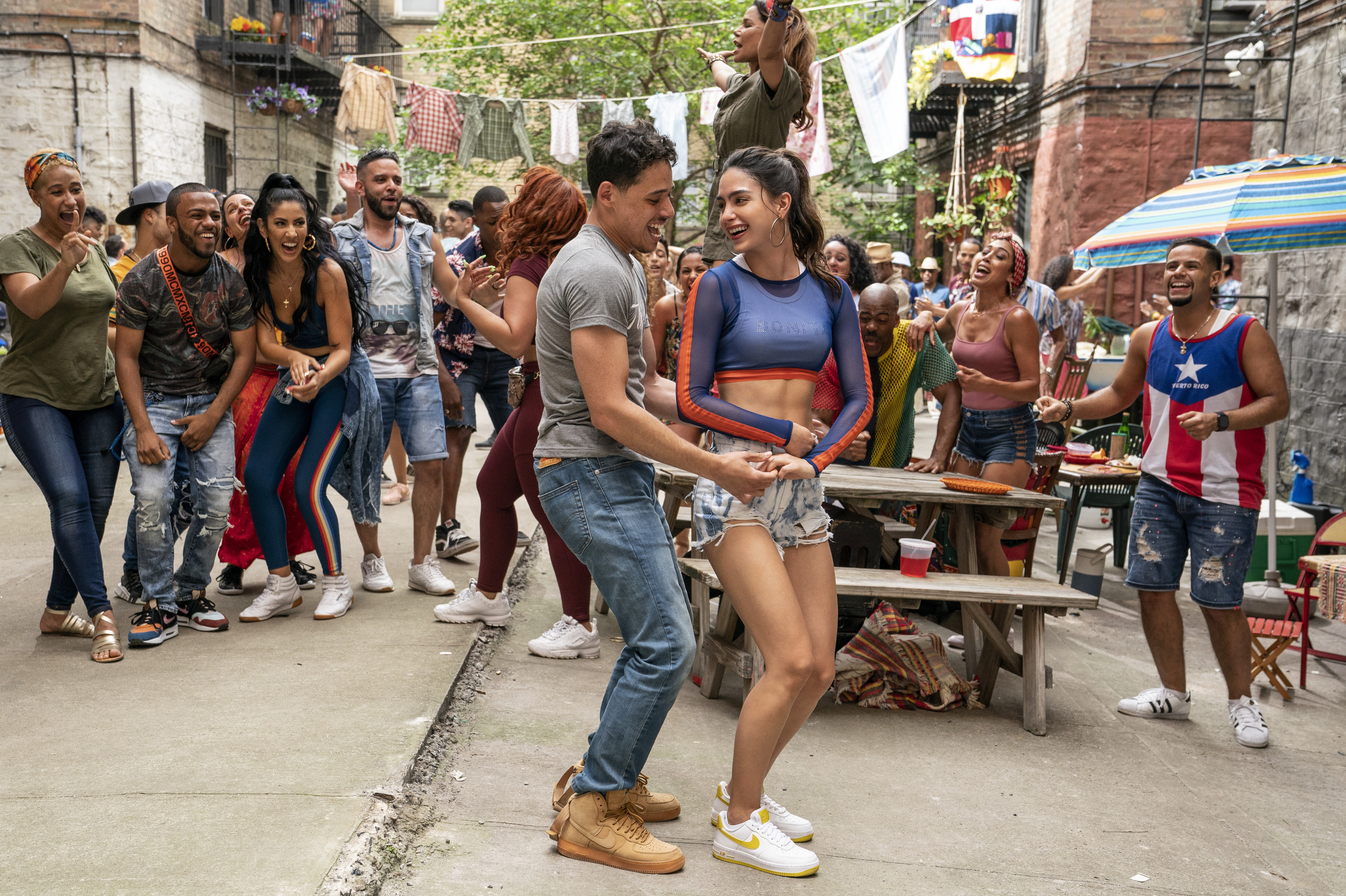 Anthony Ramos and Melissa Barrera play Usnavi and Vanessa in the film <em>In the Heights.</em> (Warner Bros.)