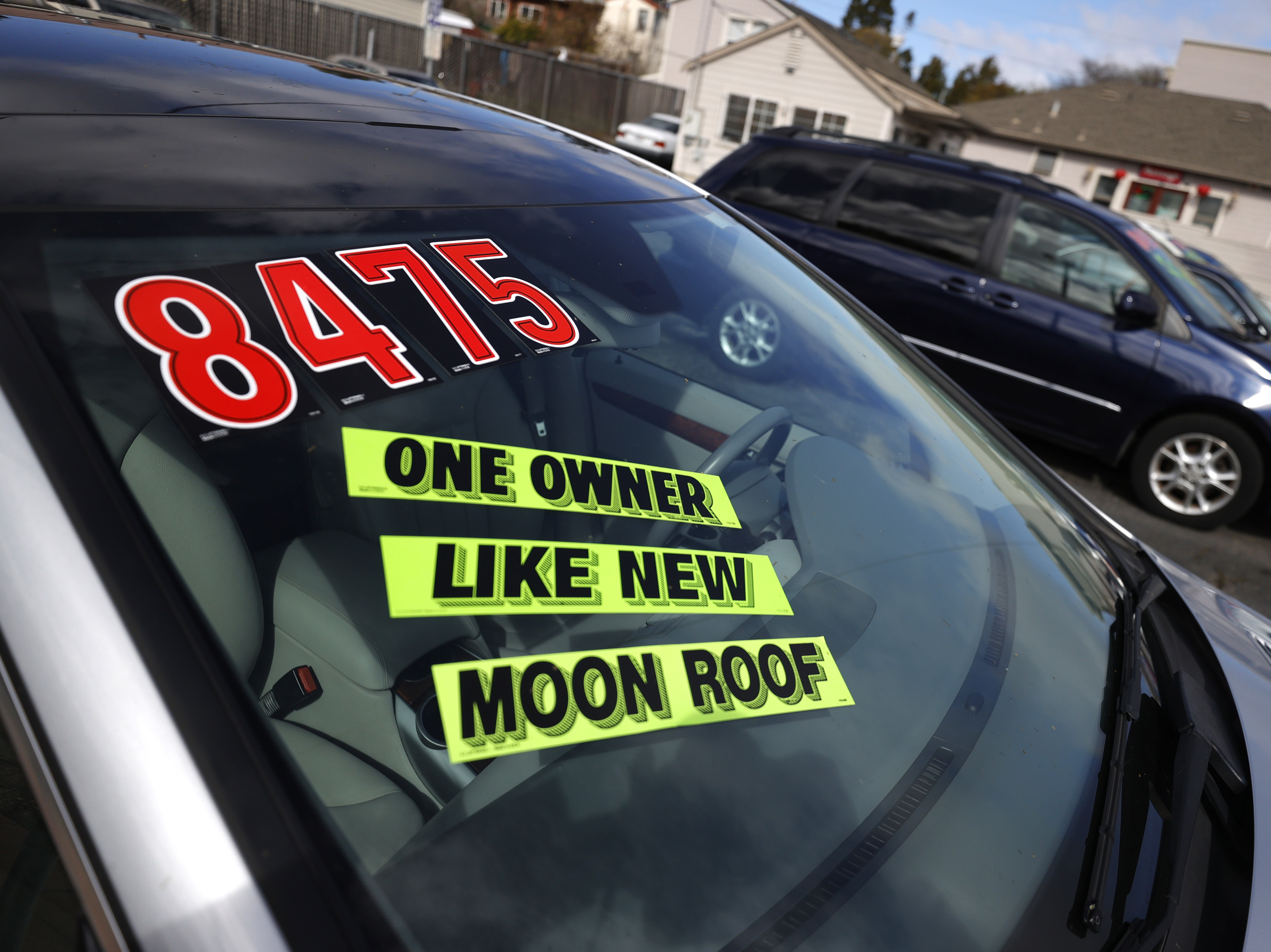 Used cars sit on the sales lot at Frank Bent's Wholesale Motors in El Cerrito, Calif., on March 15. Supply chain snarls and pent-up demand are driving up the prices of a lot of things, including new and used cars. (Getty Images)